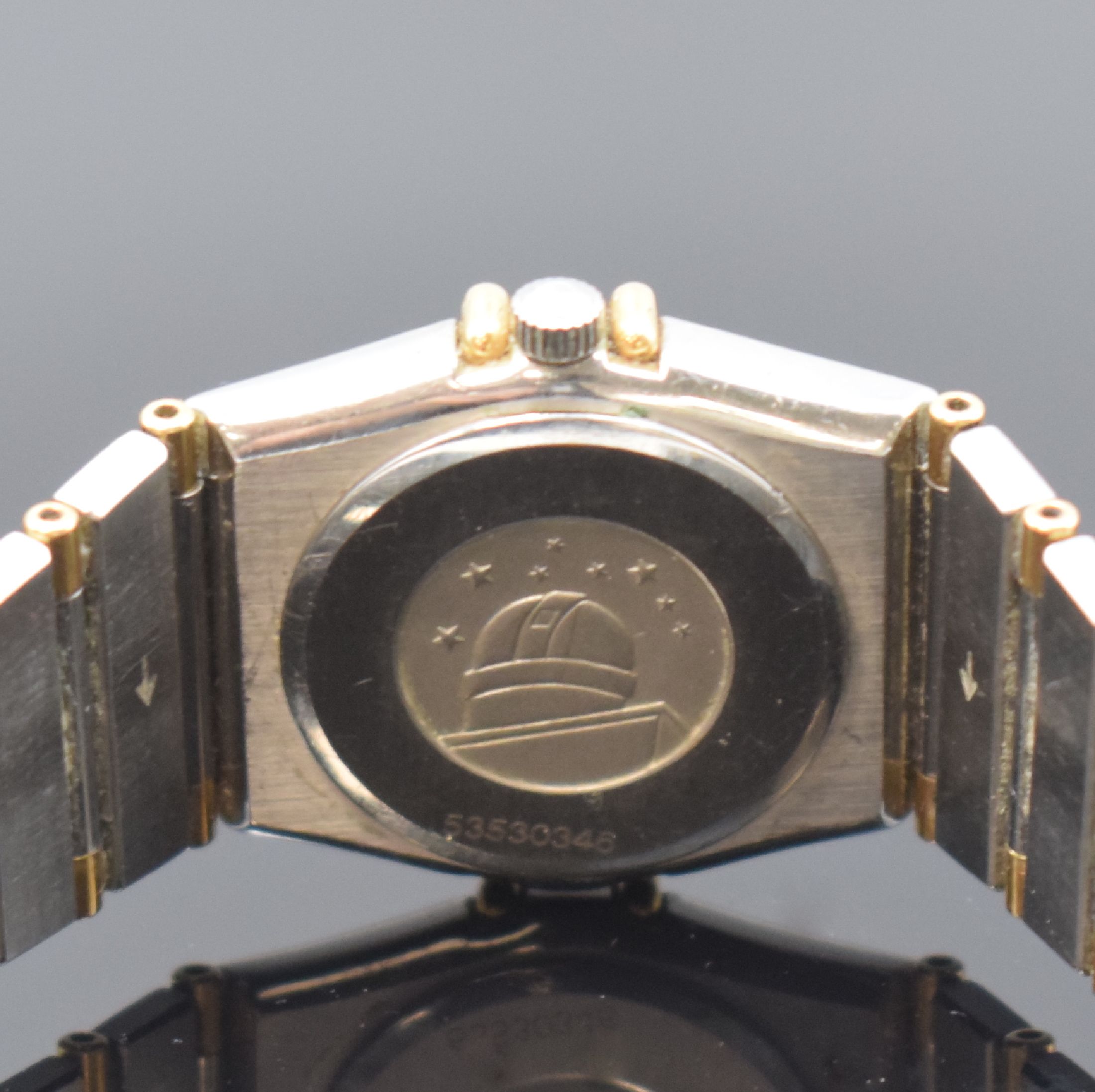 Detail c: OMEGA Constellation Damenarmbanduhr in Stahl/ Gold Referenz 795.1080, Schweiz um 1990, quarz, gedr. Geh., integriertes orig. Band, Goldlünette m. ...