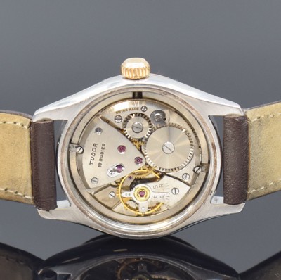 26648118d - TUDOR Oyster wristwatch in steel/gold reference 7803, Switzerland around 1955, manual winding, screwed down case back and winding crown, cream colored dial restored, gilded hour-indices, gilded luminous hands, calibre 1182, 17 jewels, movement, case and dial signed, diameter approx. 31 mm, condition 2