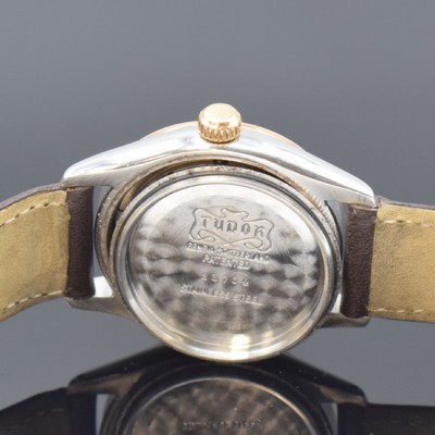 26648118e - TUDOR Oyster wristwatch in steel/gold reference 7803, Switzerland around 1955, manual winding, screwed down case back and winding crown, cream colored dial restored, gilded hour-indices, gilded luminous hands, calibre 1182, 17 jewels, movement, case and dial signed, diameter approx. 31 mm, condition 2