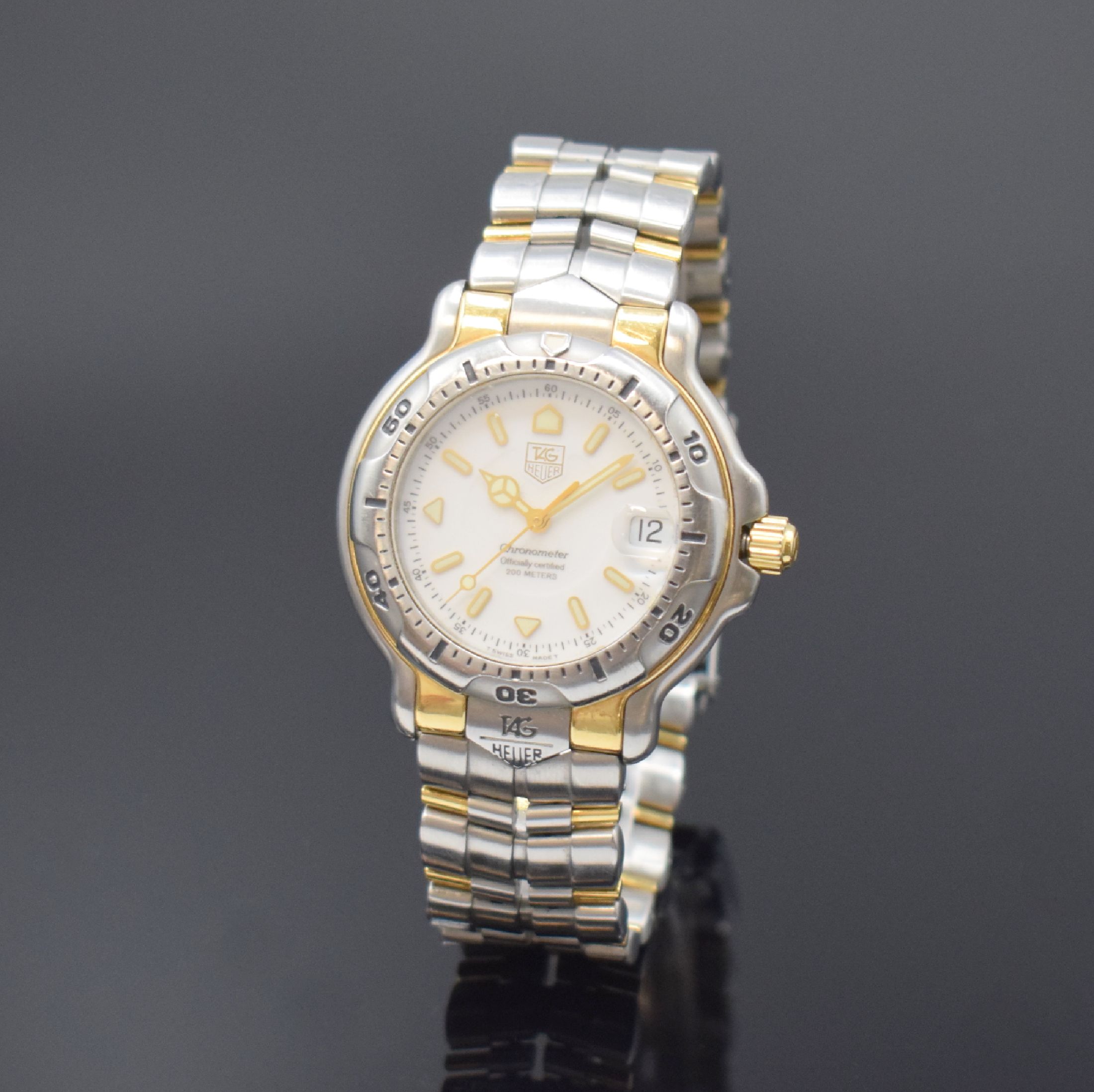 TAG HEUER Chronometer Herrenarmbanduhr, Schweiz um 1990, Automatik, Ref. WH5151, Edelstahl/Gold komb. inkl. orig. Gliederband m. Faltschl., Krone u. ...