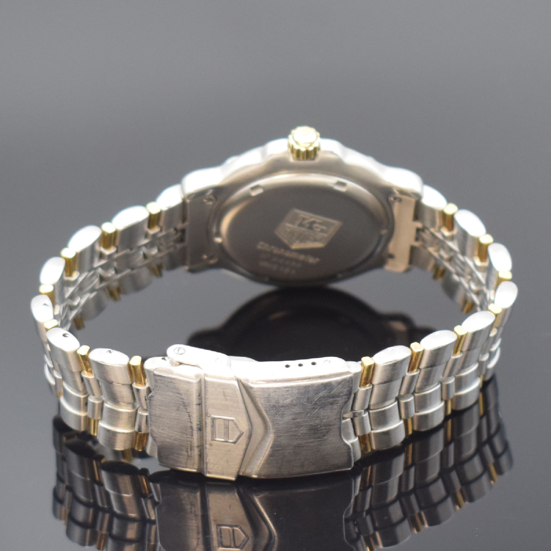 Detail b: TAG HEUER Chronometer Herrenarmbanduhr, Schweiz um 1990, Automatik, Ref. WH5151, Edelstahl/Gold komb. inkl. orig. Gliederband m. Faltschl., Krone u. ...