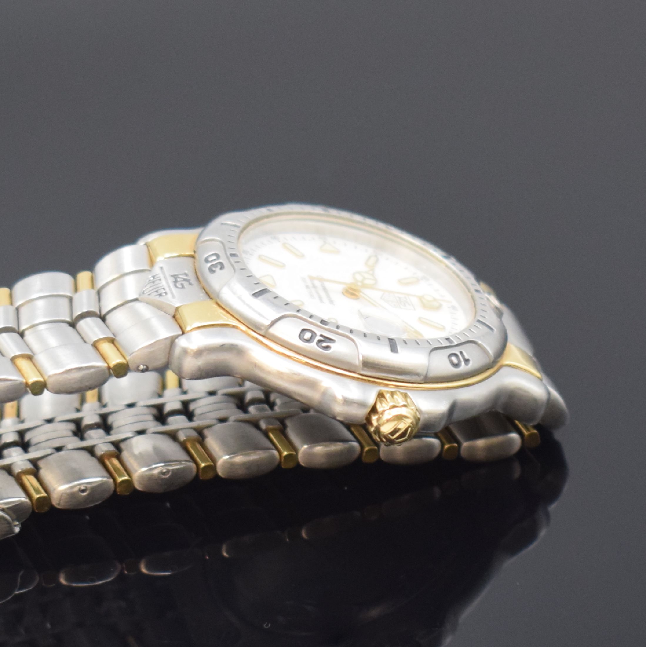 Detail c: TAG HEUER Chronometer Herrenarmbanduhr, Schweiz um 1990, Automatik, Ref. WH5151, Edelstahl/Gold komb. inkl. orig. Gliederband m. Faltschl., Krone u. ...