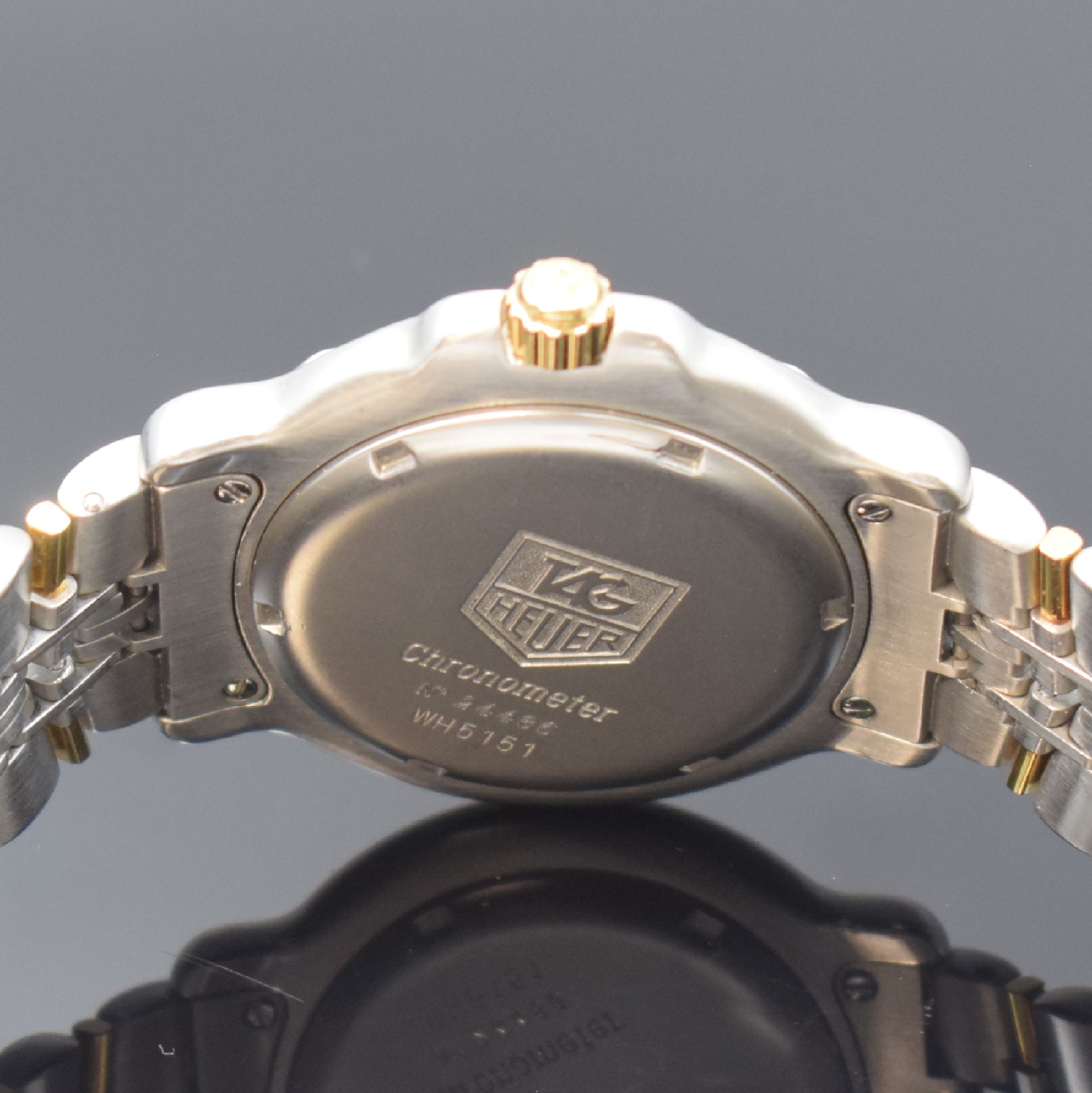 Detail d: TAG HEUER Chronometer Herrenarmbanduhr, Schweiz um 1990, Automatik, Ref. WH5151, Edelstahl/Gold komb. inkl. orig. Gliederband m. Faltschl., Krone u. ...