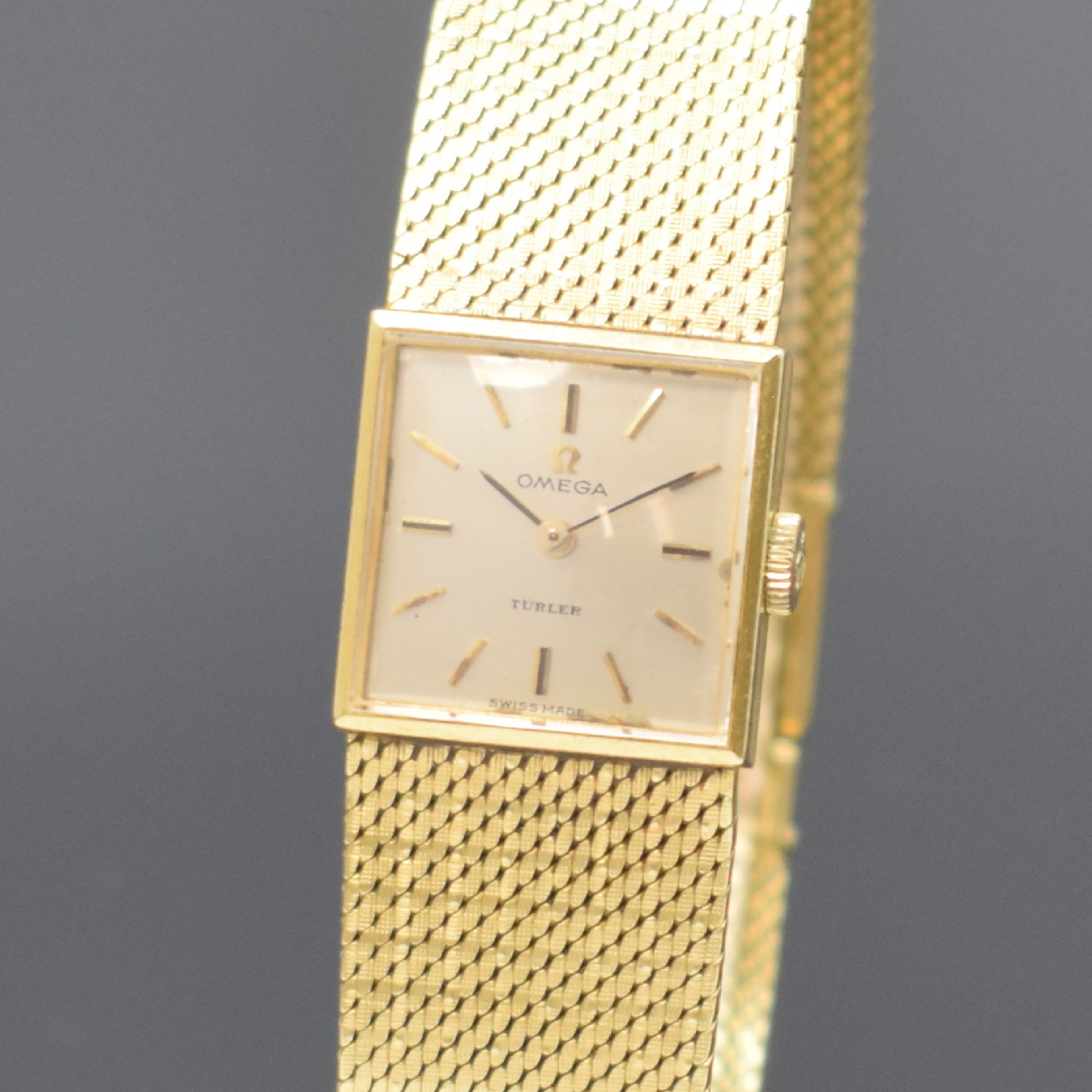 Detail a: OMEGA / TÜRLER Damenarmbanduhr in GG 750/000 Referenz 8108, Handaufzug, 2-teil. Geh., Boden aufgedr., silb. Zifferbl. m. aufgel. Indizes l. fl., ...