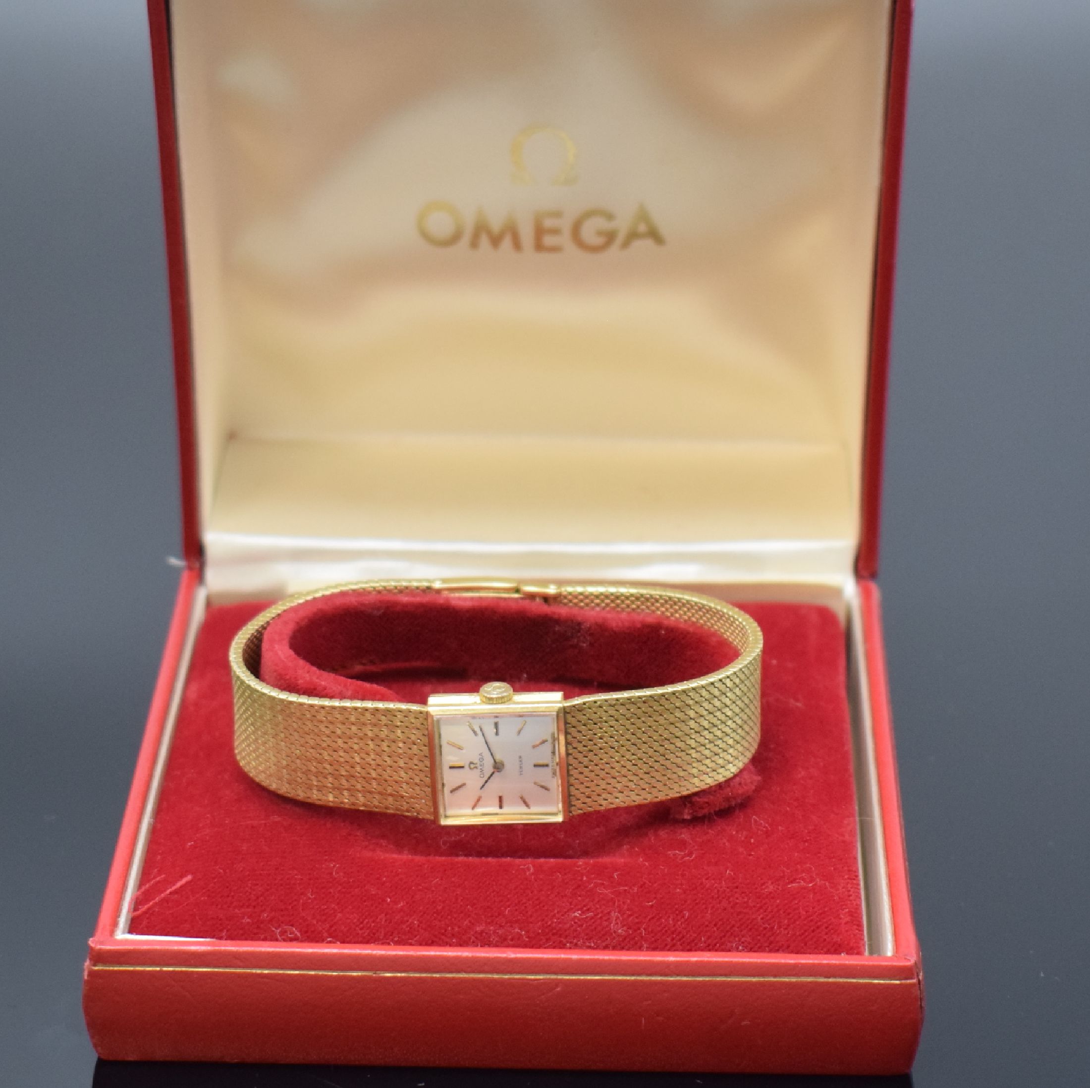 Detail f: OMEGA / TÜRLER Damenarmbanduhr in GG 750/000 Referenz 8108, Handaufzug, 2-teil. Geh., Boden aufgedr., silb. Zifferbl. m. aufgel. Indizes l. fl., ...
