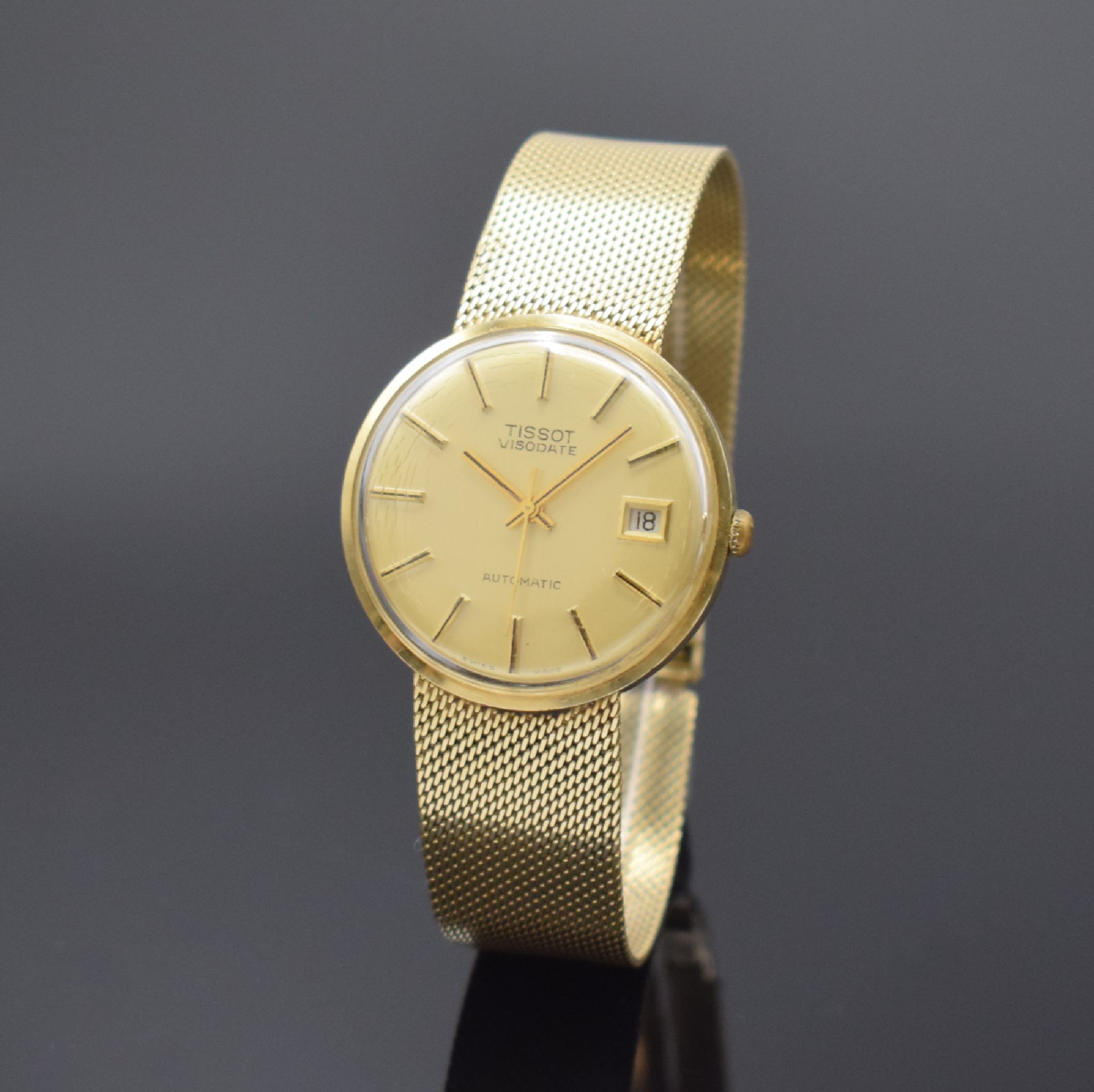 TISSOT Visodate Armbanduhr in GG 585/000 Referenz 6359, Schweiz um 1970, Automatik, Boden aufgedr., Milanaiseband, gold. Zifferbl. mit aufges. ...