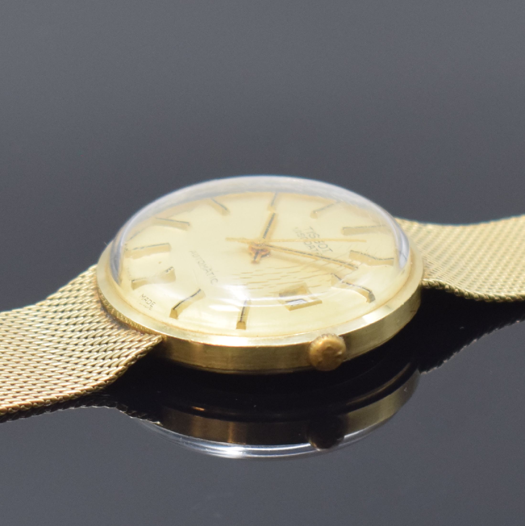Detail d: TISSOT Visodate Armbanduhr in GG 585/000 Referenz 6359, Schweiz um 1970, Automatik, Boden aufgedr., Milanaiseband, gold. Zifferbl. mit aufges. ...