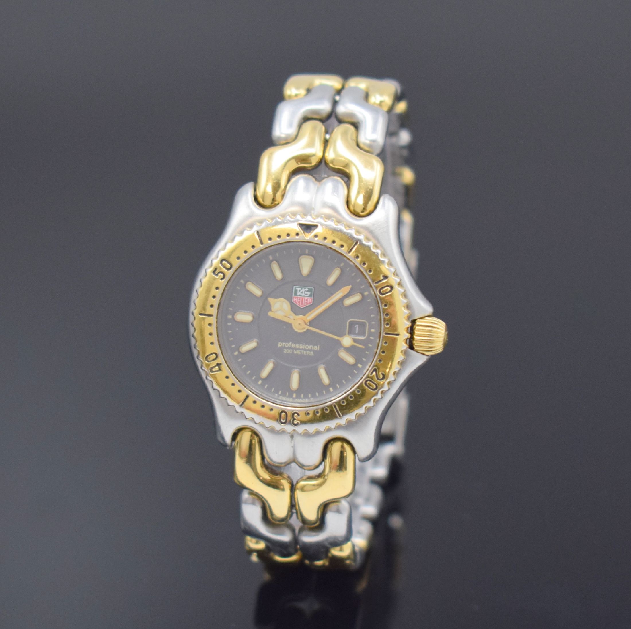 TAG HEUER Professional Damensportuhr Referenz WG 1320-0, Schweiz um 1990, quartz, Geh. u. Band Stahl z. T. verg., Boden u. Krone verschr., eins. ...