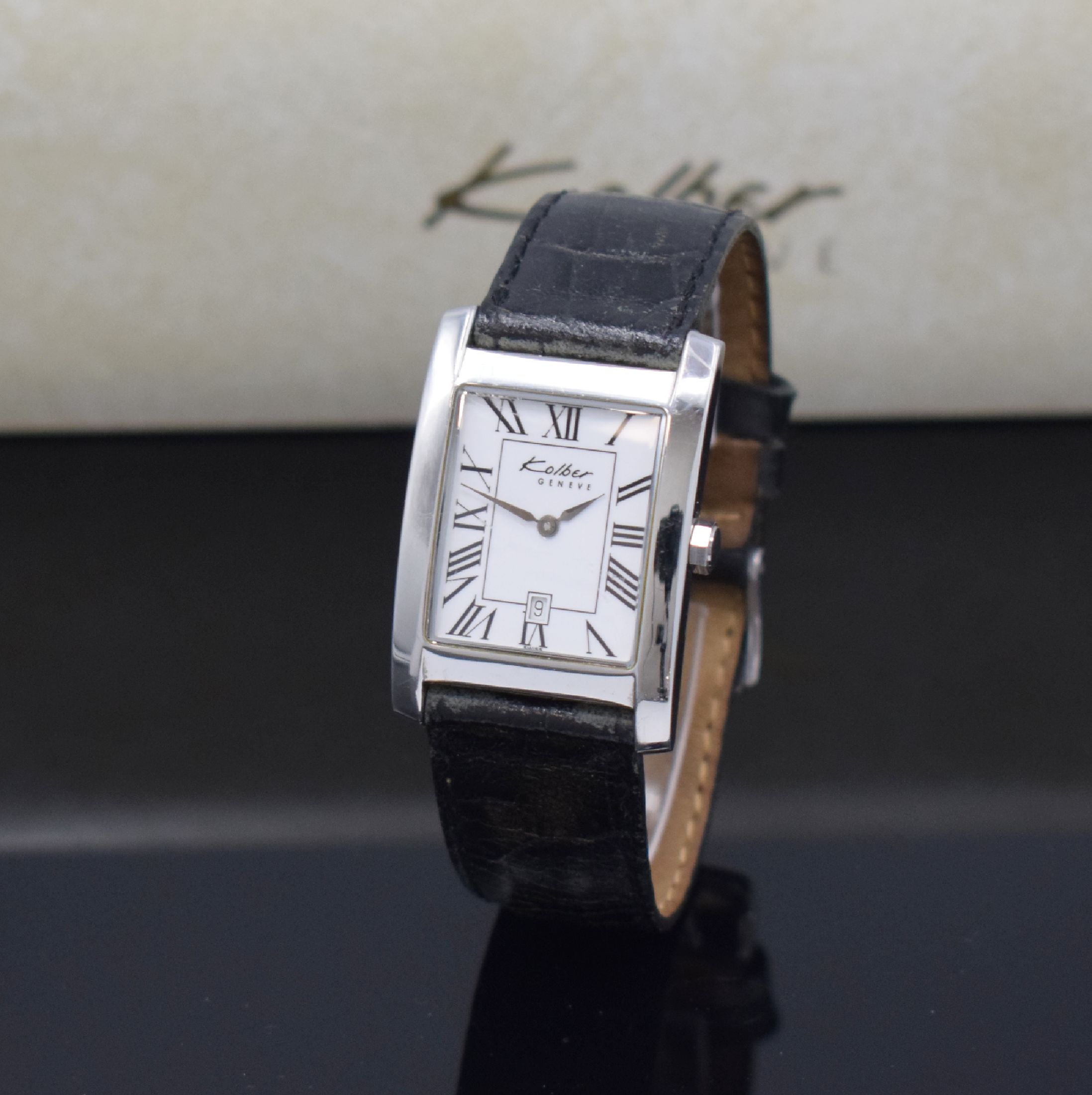 KOLBER Geneve Armbanduhr in Stahl, Schweiz um 2000, quarz, Boden aufgedr., emailfarb. Zifferbl. m. röm. Std., Anz. v. Std., Min. und Datum, D. ca. ...