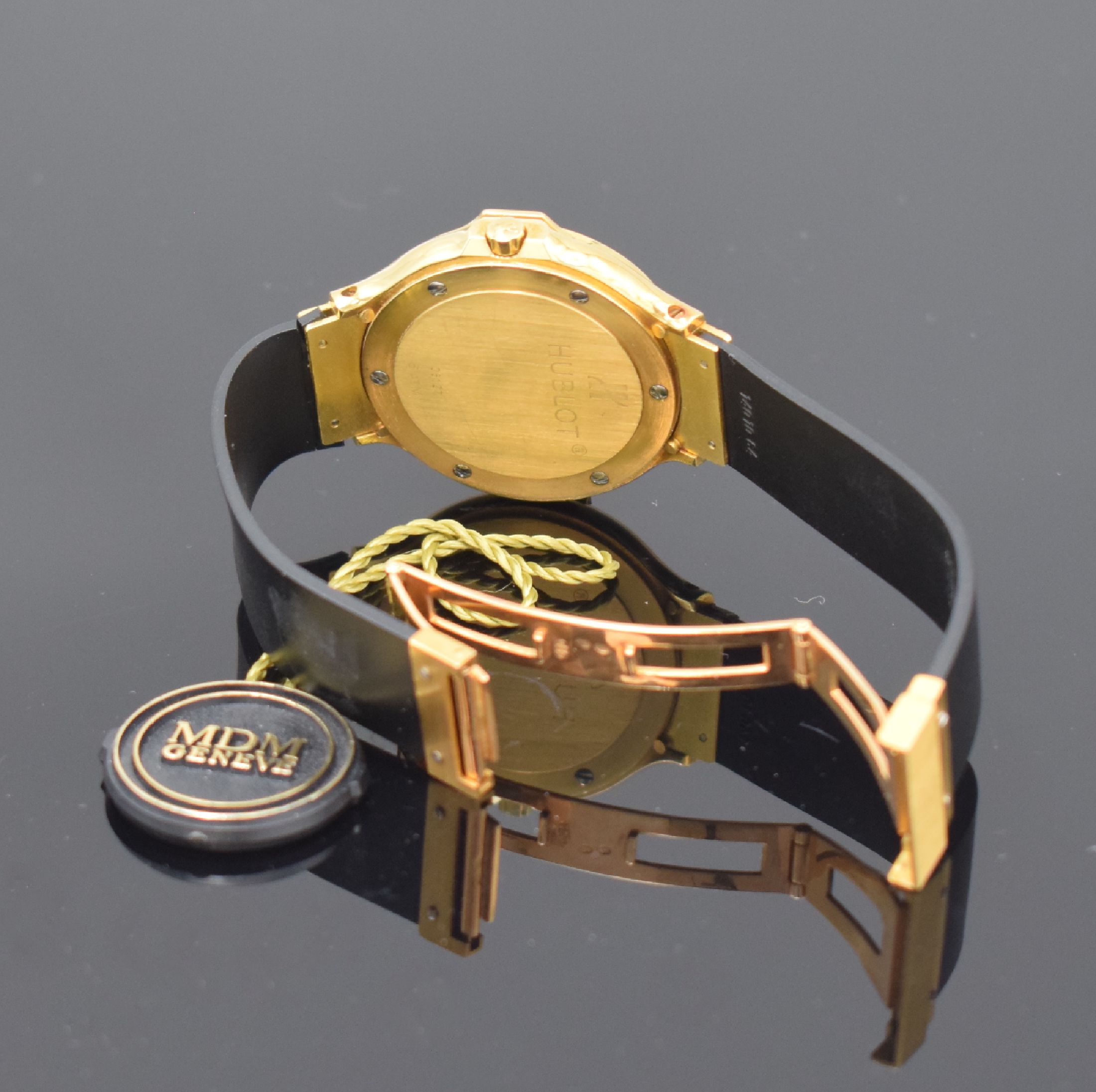 Detail e: HUBLOT MDM Armbanduhr in GG 750/000, Schweiz um 1988, orig. Kautschukband m. dopp. Faltschl. in GG 750/000, Boden 6-fach verschr., über Zifferbl. ...