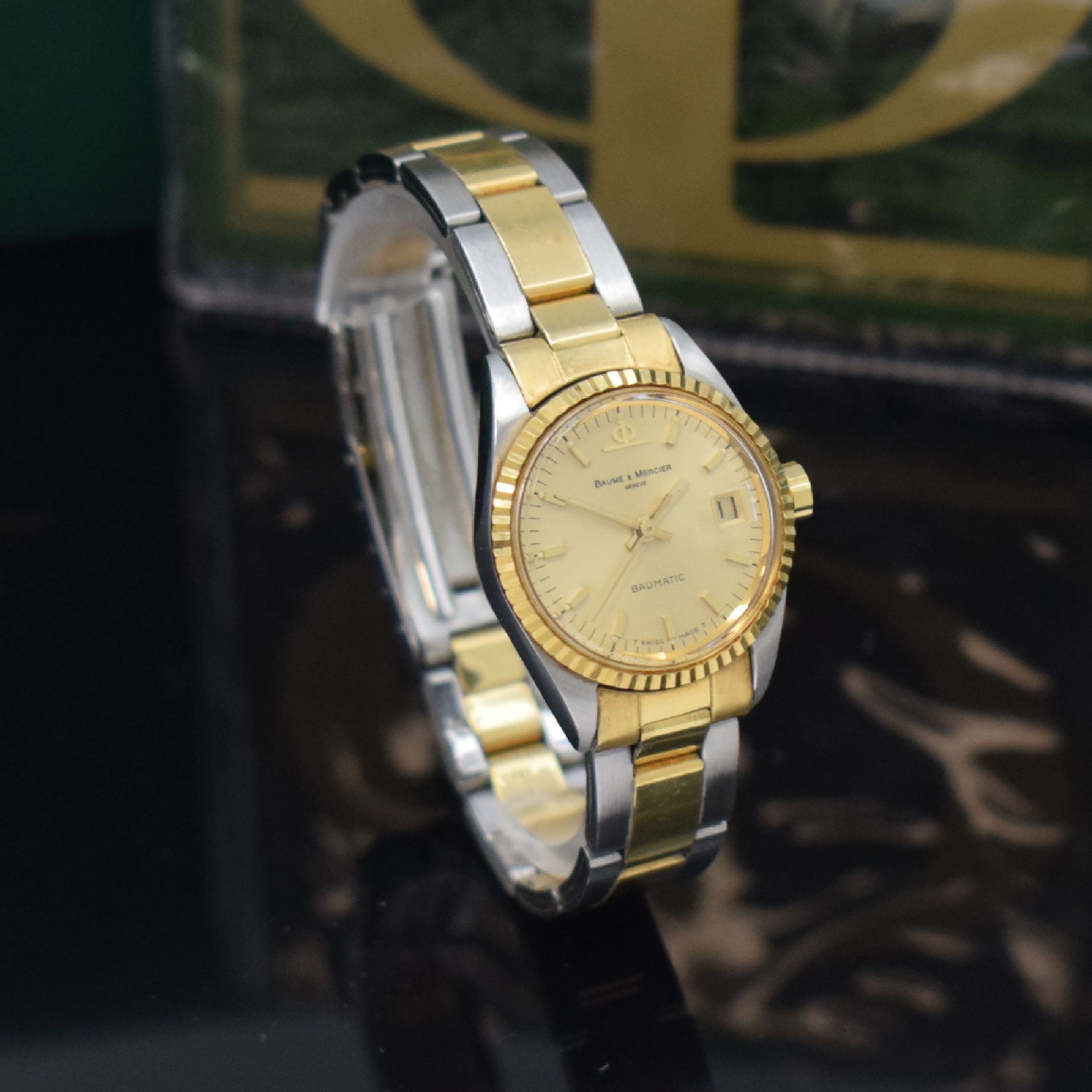 Detail c: BAUME & MERCIER Damenarmbanduhr Baumatic Referenz 1215 2, Automatik, Edelstahl/Gold kombiniert inkl. Gliederband m. Faltschl., Boden verschr., ...