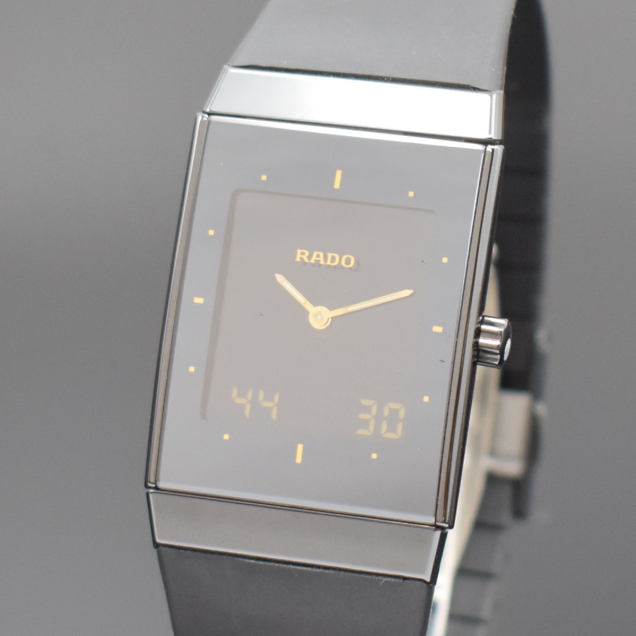 Detail b: RADO Diastar Herrenarmbanduhr mit Multifunktionsanzeige, Schweiz verk. lt. beil. Pap. 07/1996, quarz, Ref. 193.0324.3, Keramikgeh., 4-fach verschr. ...