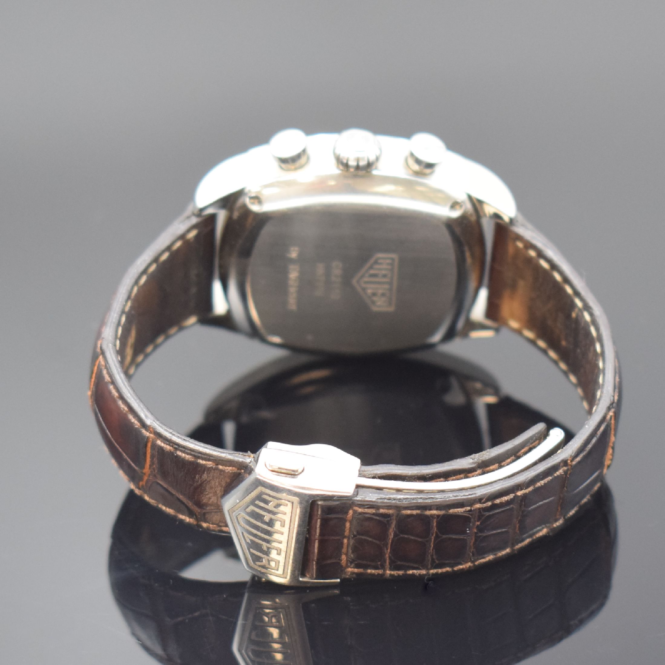 Detail b: HEUER Monza Herrenarmbanduhr mit Chronograph Referenz CR2110, Schweiz um 2000, Automatik, 2-teil. Edelstahlgeh., Boden 4-fach verschr., orig. ...