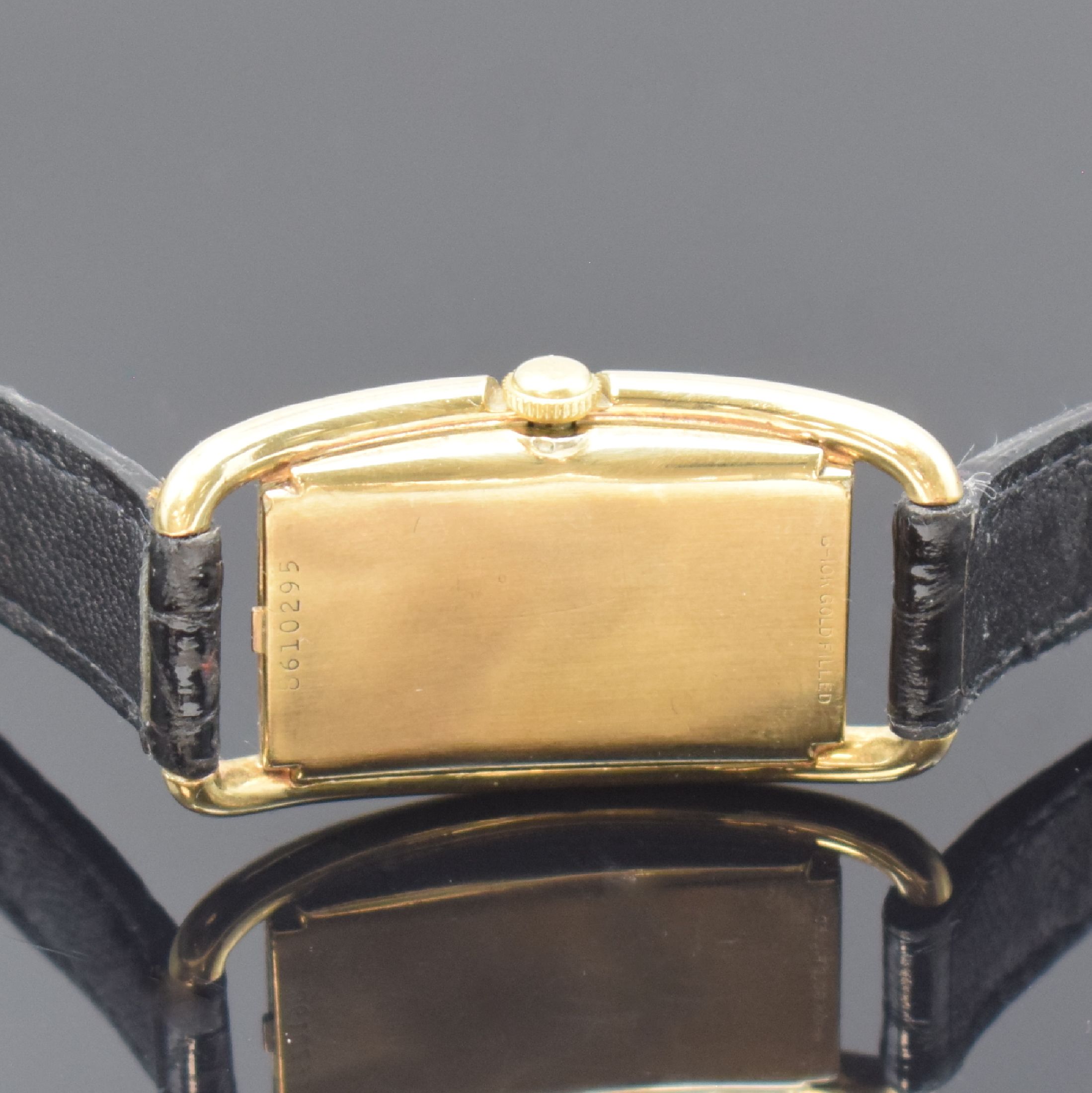 Detail c: BULOVA "Curvex" rechteckige Armbanduhr, USA um 1940, Handaufzug, gebogenes gold-filled Geh., Boden aufgedr., silb. Zifferbl. pat./fl., ...