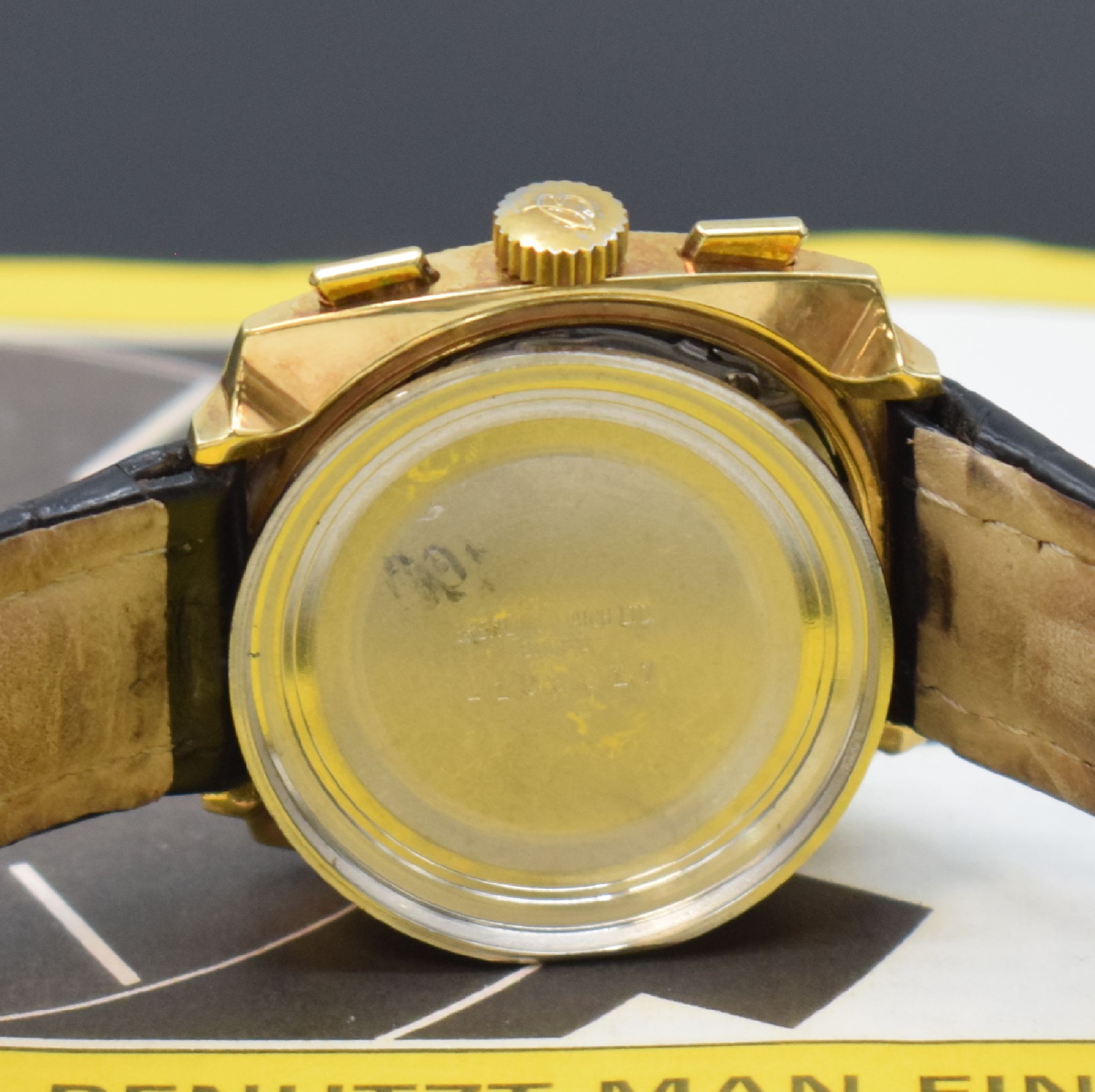 Detail e: BREITLING Top Time Herrenchronograph Referenz 2008, Schweiz um 1966, Handaufzug, verg. Carré-Cambré-Geh., gedr. Stahlboden, Borken- Lünette, ...