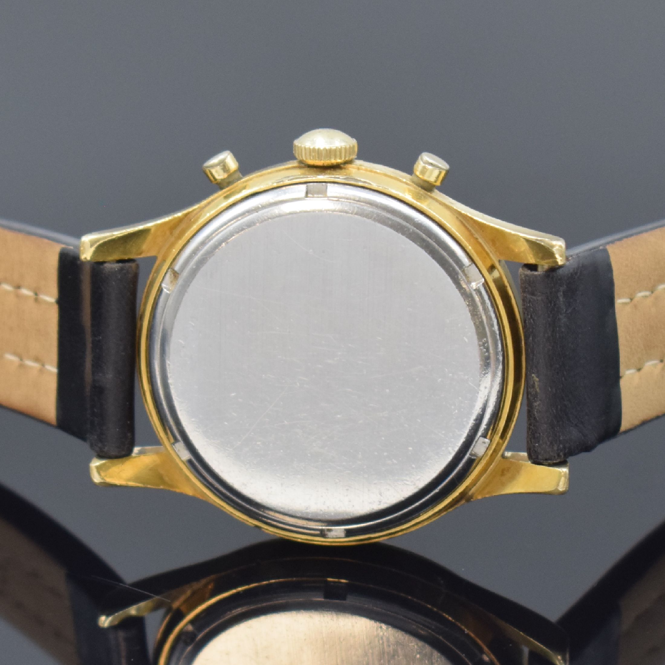 Detail c: HEUER Schaltradchronograph im vergoldeten Gehäuse, Schweiz um 1965, Handaufzug, Geh. m. verschr. Stahlboden, silb. orig. Zifferbl., gold. Indizes u. ...