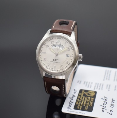 Image IWC Die Fliegeruhr Spitfire UTC, self winding, reference 325/07, screwed down case back and winding crown, neutral leather strap with original buckle, silvered dial with Arabic numerals, luminous hands, date at 3, diameter approx. 39 mm, warranty papers enclosed, bezel with small dent, condition 2