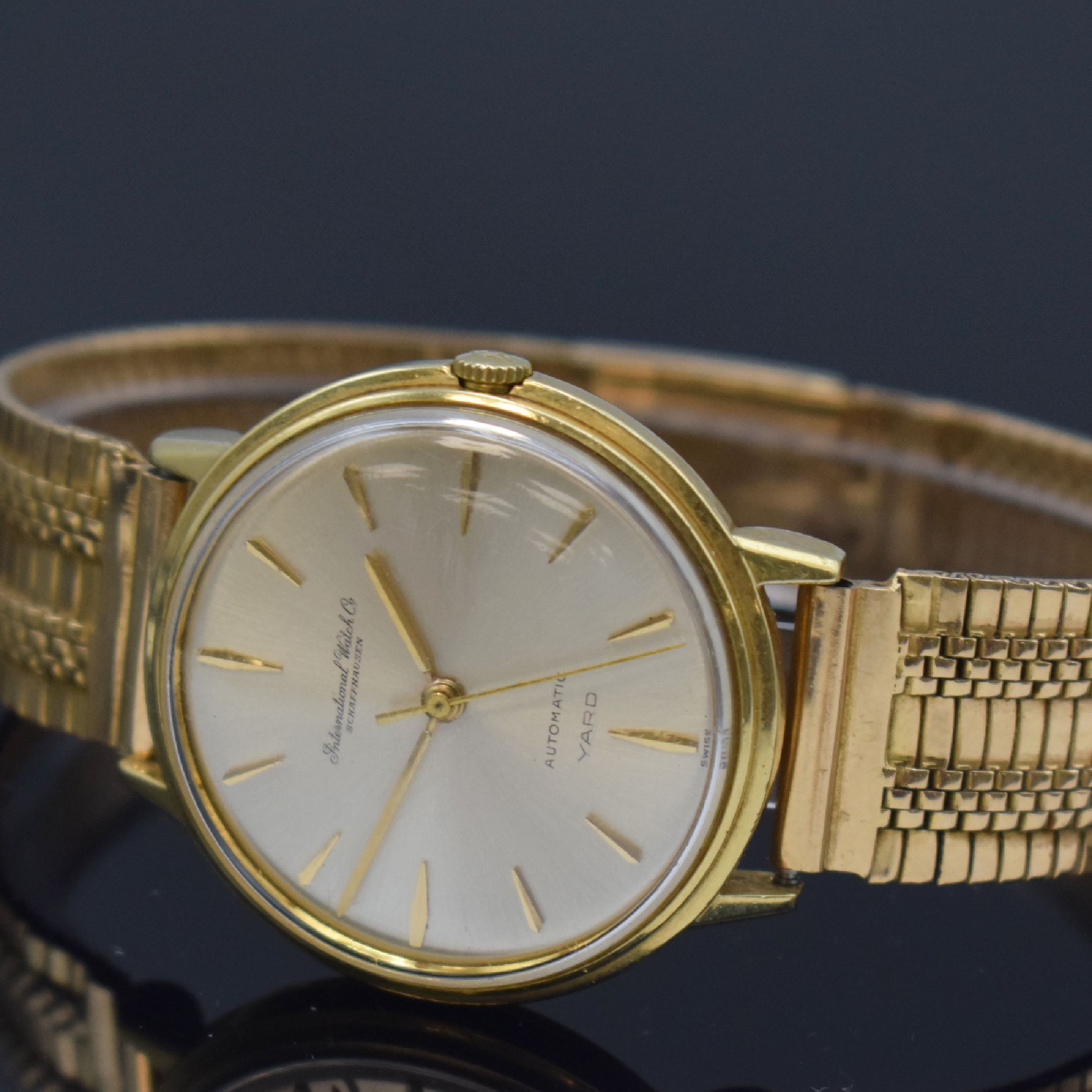 Detail b: IWC Automatic Yard Armbanduhr in GG 750/000 am neutralen Goldband in RG 750/000, Schweiz um 1960, 2-tlg. Geh., Boden aufgedr., orig. Krone, silb. ...