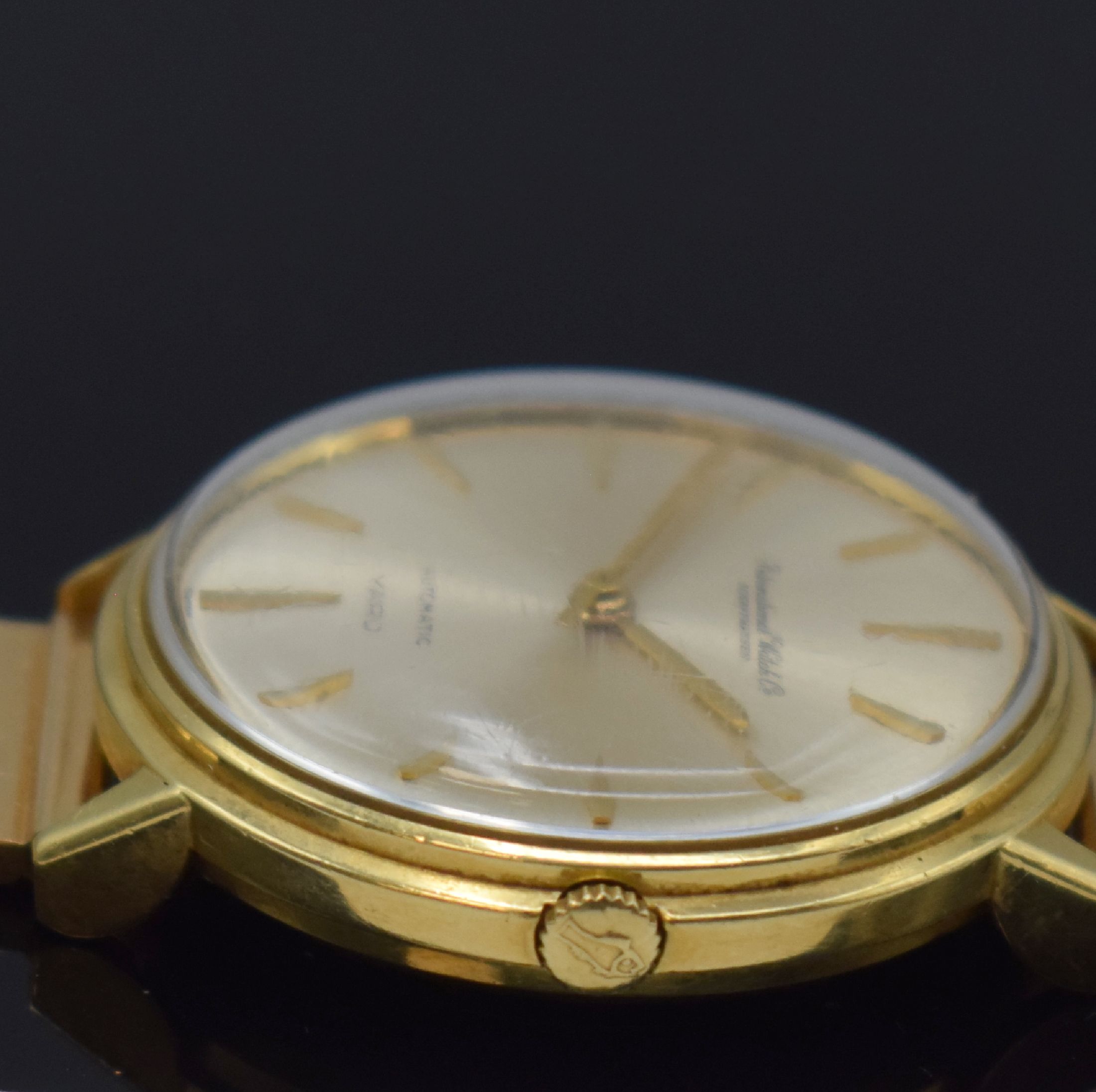 Detail d: IWC Automatic Yard Armbanduhr in GG 750/000 am neutralen Goldband in RG 750/000, Schweiz um 1960, 2-tlg. Geh., Boden aufgedr., orig. Krone, silb. ...