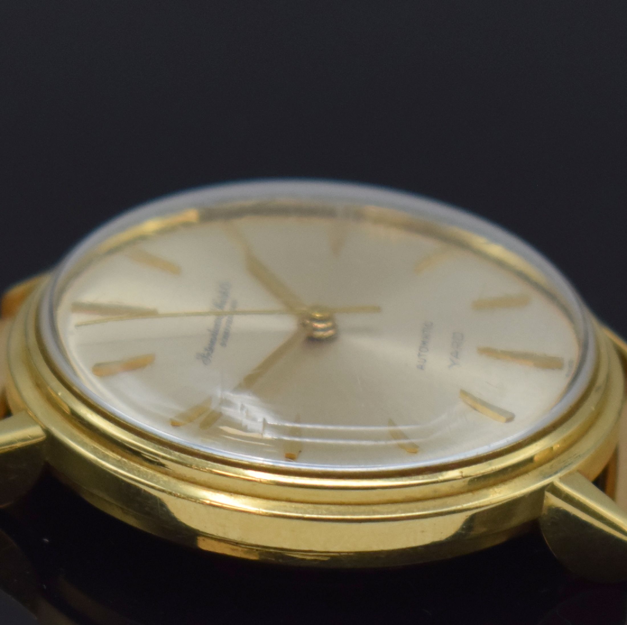 Detail e: IWC Automatic Yard Armbanduhr in GG 750/000 am neutralen Goldband in RG 750/000, Schweiz um 1960, 2-tlg. Geh., Boden aufgedr., orig. Krone, silb. ...