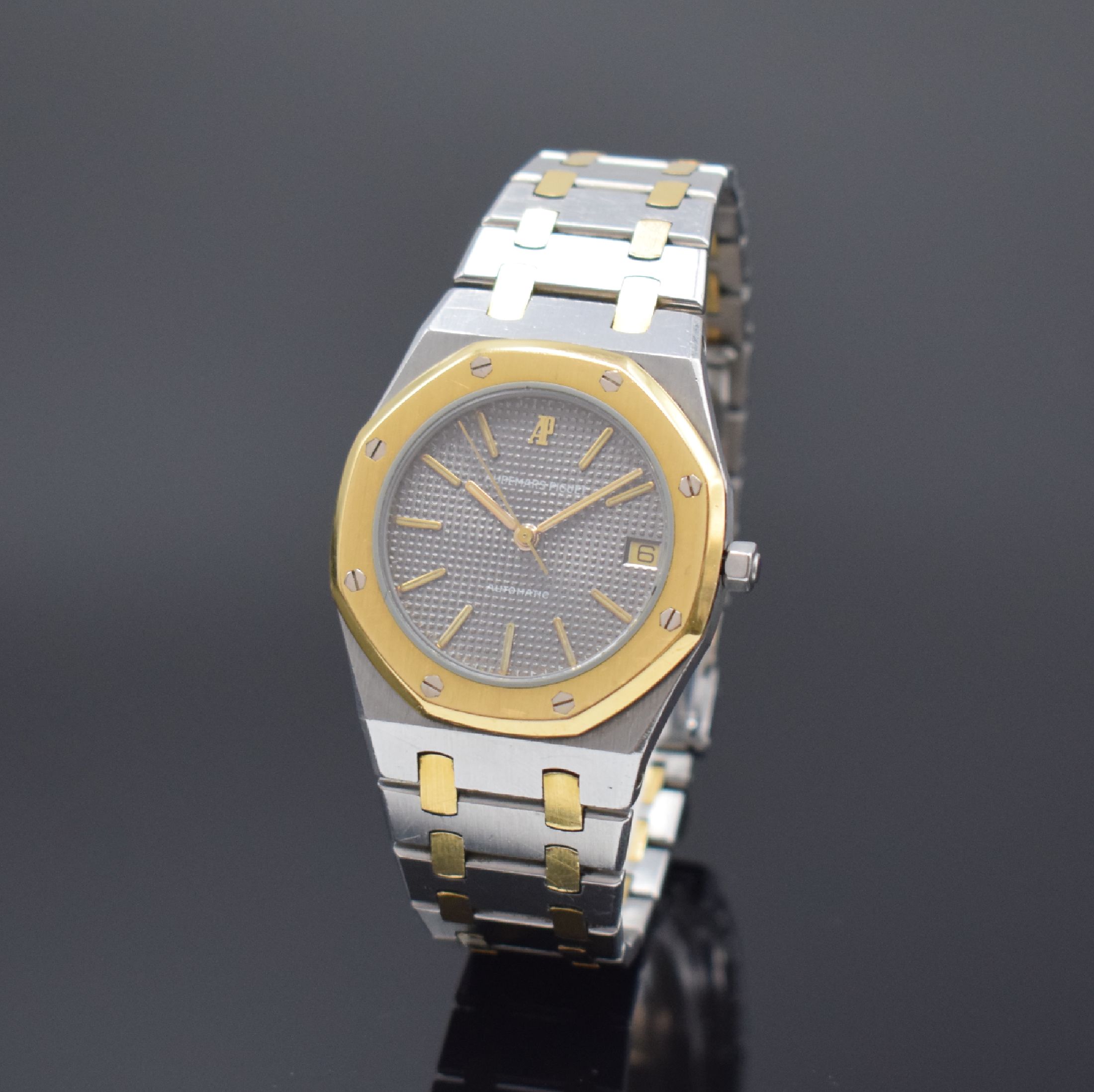 AUDEMARS PIGUET Royal Oak Referenz 14100SA Armbanduhr in Stahl/Gold, Schweiz um 1980, Automatik, Lünette gegen Boden 8-fach verschr. Geh., integr. ...