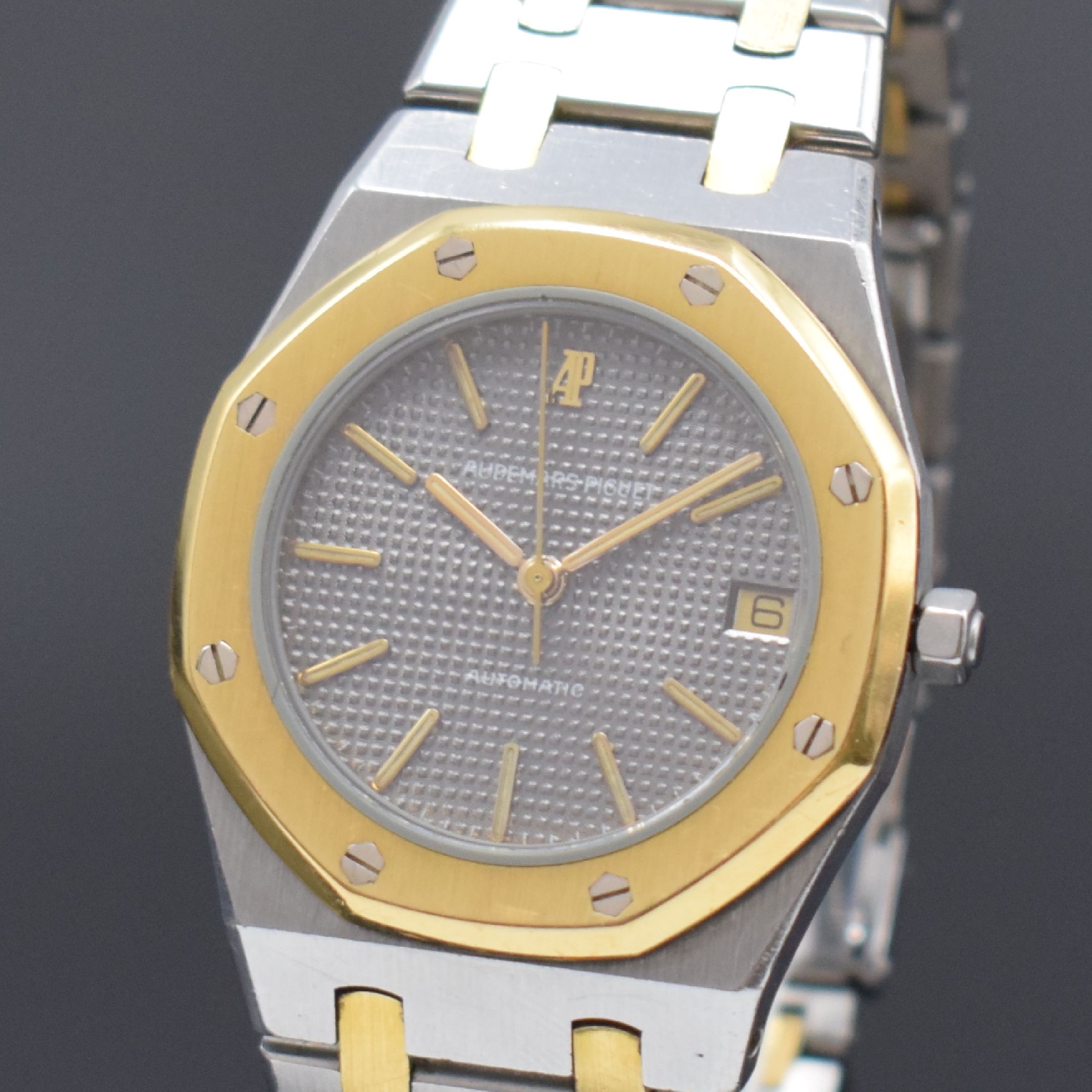 Detail a: AUDEMARS PIGUET Royal Oak Referenz 14100SA Armbanduhr in Stahl/Gold, Schweiz um 1980, Automatik, Lünette gegen Boden 8-fach verschr. Geh., integr. ...