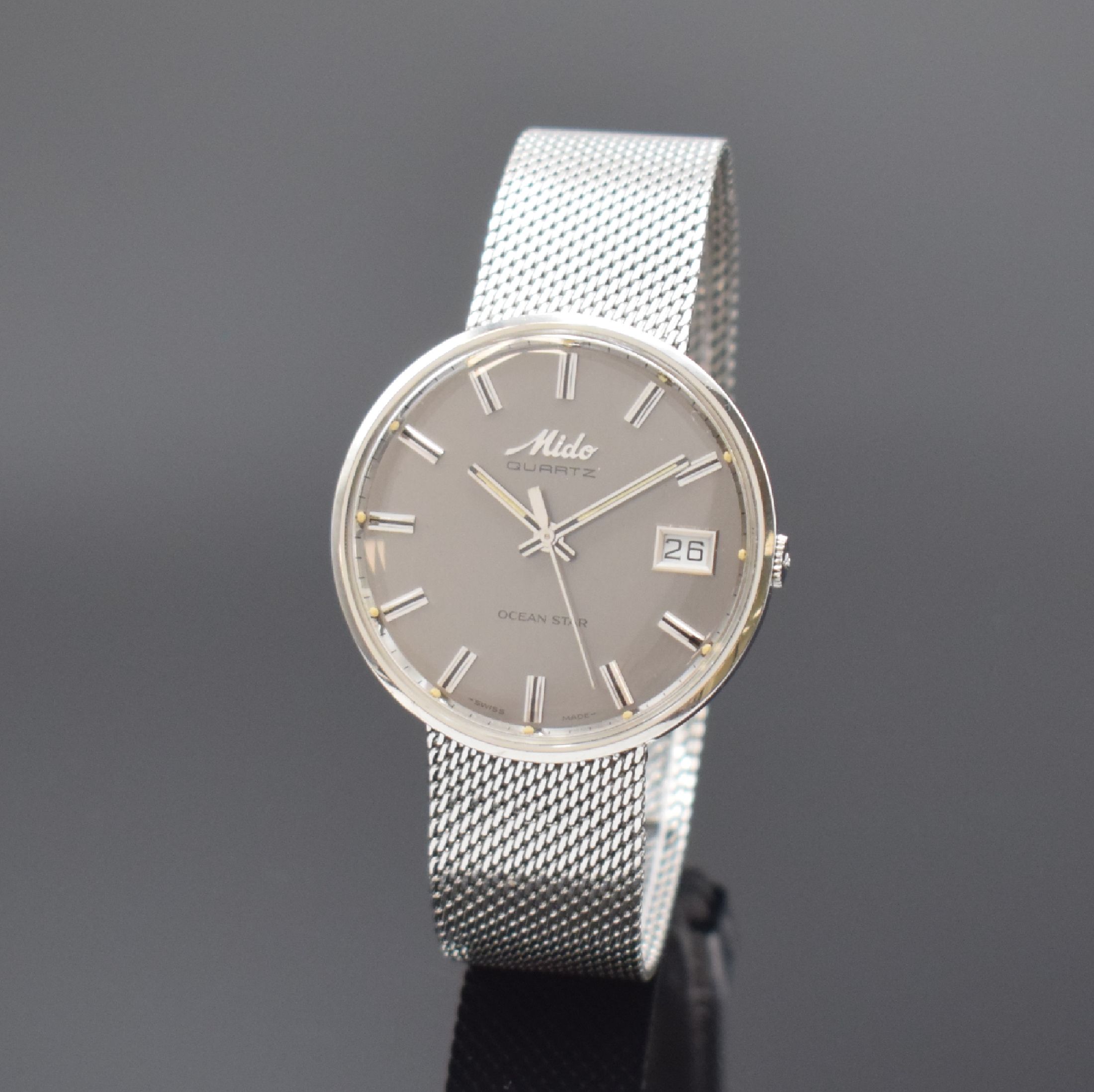 MIDO Ocean Star Quartz Herrenarmbanduhr in Stahl, Schweiz um 1975, Monocoque-Geh., orig. Glas u. Krone, integr. orig. Milanaise- band, graues ...