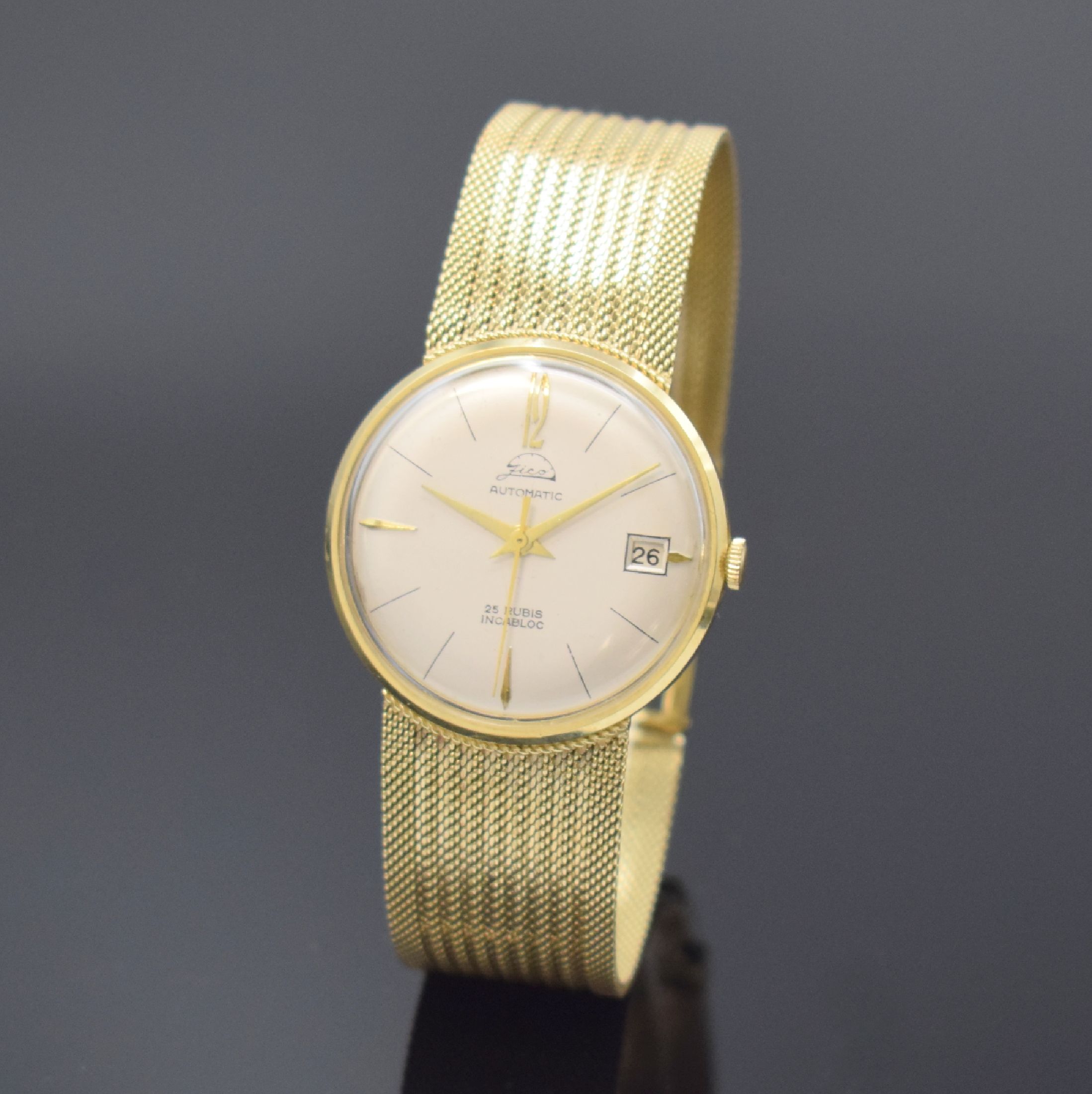 ZICO Herrengoldbanduhr in GG 585/000, Schweiz um 1965, Automatik, 3-tlg. Geh., Boden u. Glasrand aufgedr., anges. Milanaiseband, silb. Zifferbl., ...