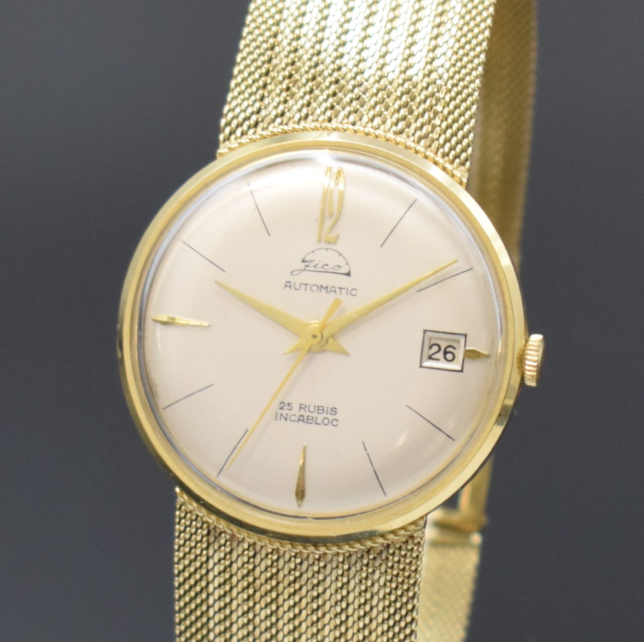 Detail a: ZICO Herrengoldbanduhr in GG 585/000, Schweiz um 1965, Automatik, 3-tlg. Geh., Boden u. Glasrand aufgedr., anges. Milanaiseband, silb. Zifferbl., ...