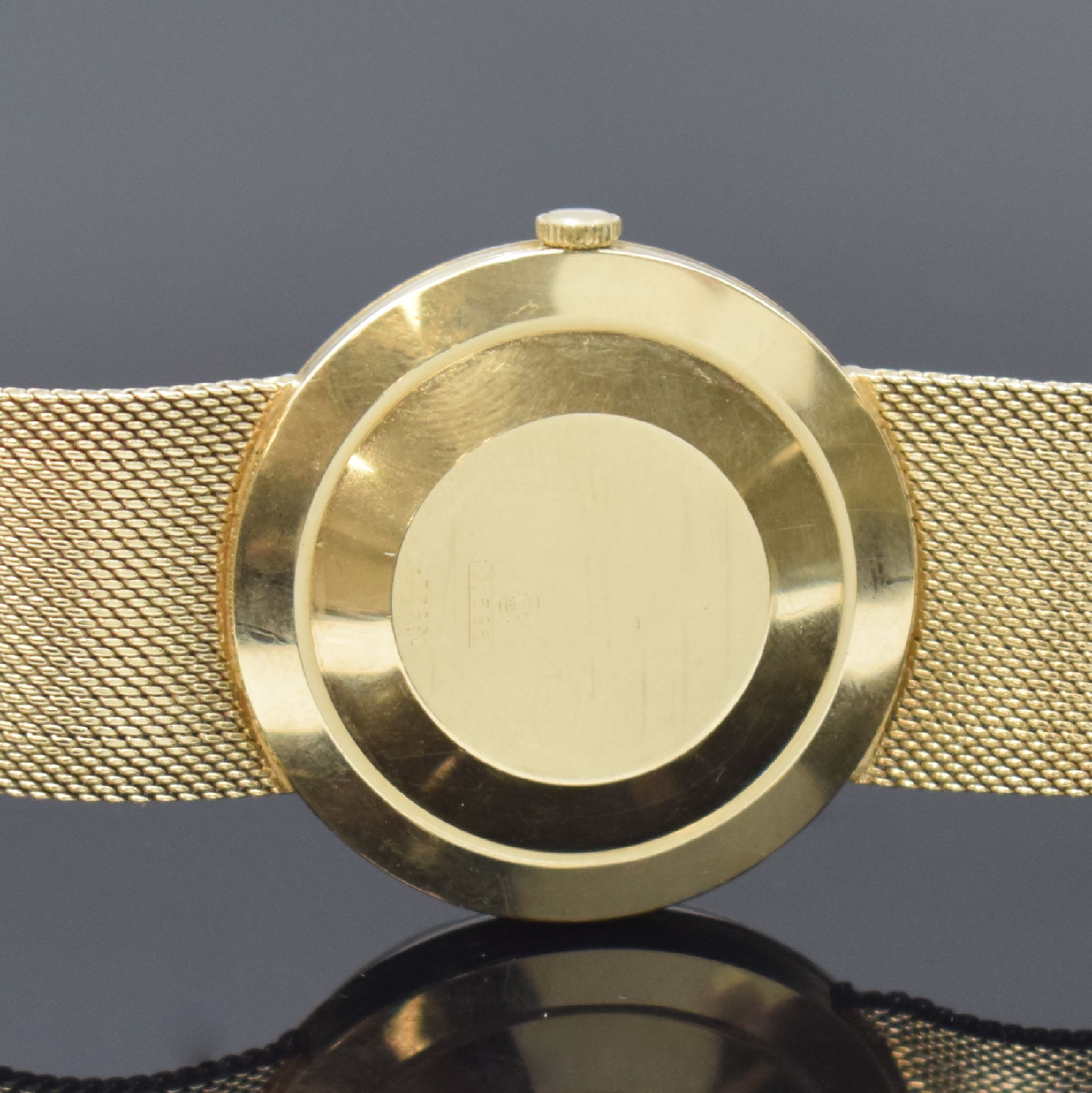 Detail c: ZICO Herrengoldbanduhr in GG 585/000, Schweiz um 1965, Automatik, 3-tlg. Geh., Boden u. Glasrand aufgedr., anges. Milanaiseband, silb. Zifferbl., ...