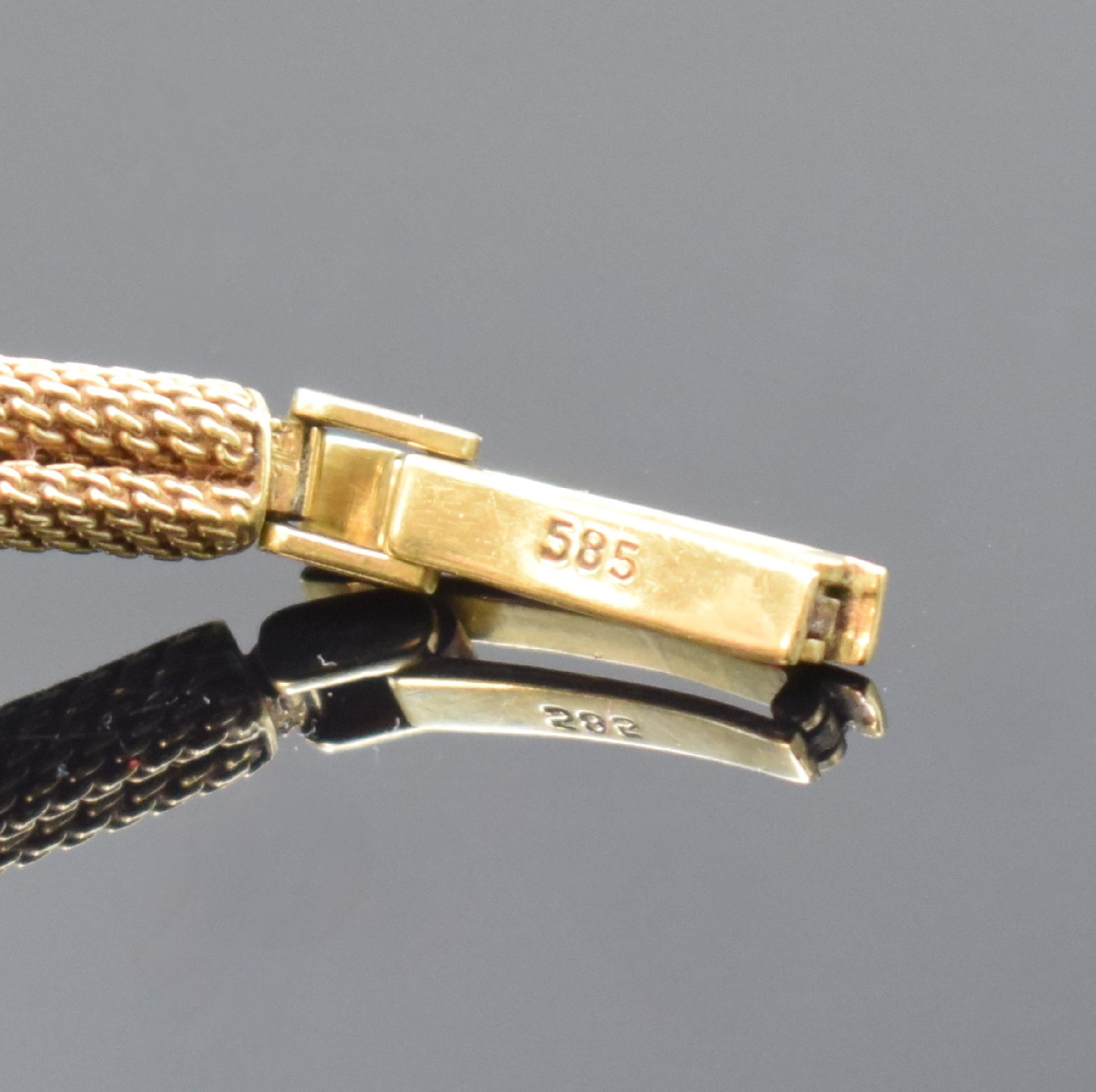 Detail b: ESCO Damenarmbanduhr in GG 585/000, Schweiz um 1965, Handaufzug, gedr. Geh., gefaltet anges. Milanaiseband, silb. Zifferbl. fl., gold. Indizes u. ...