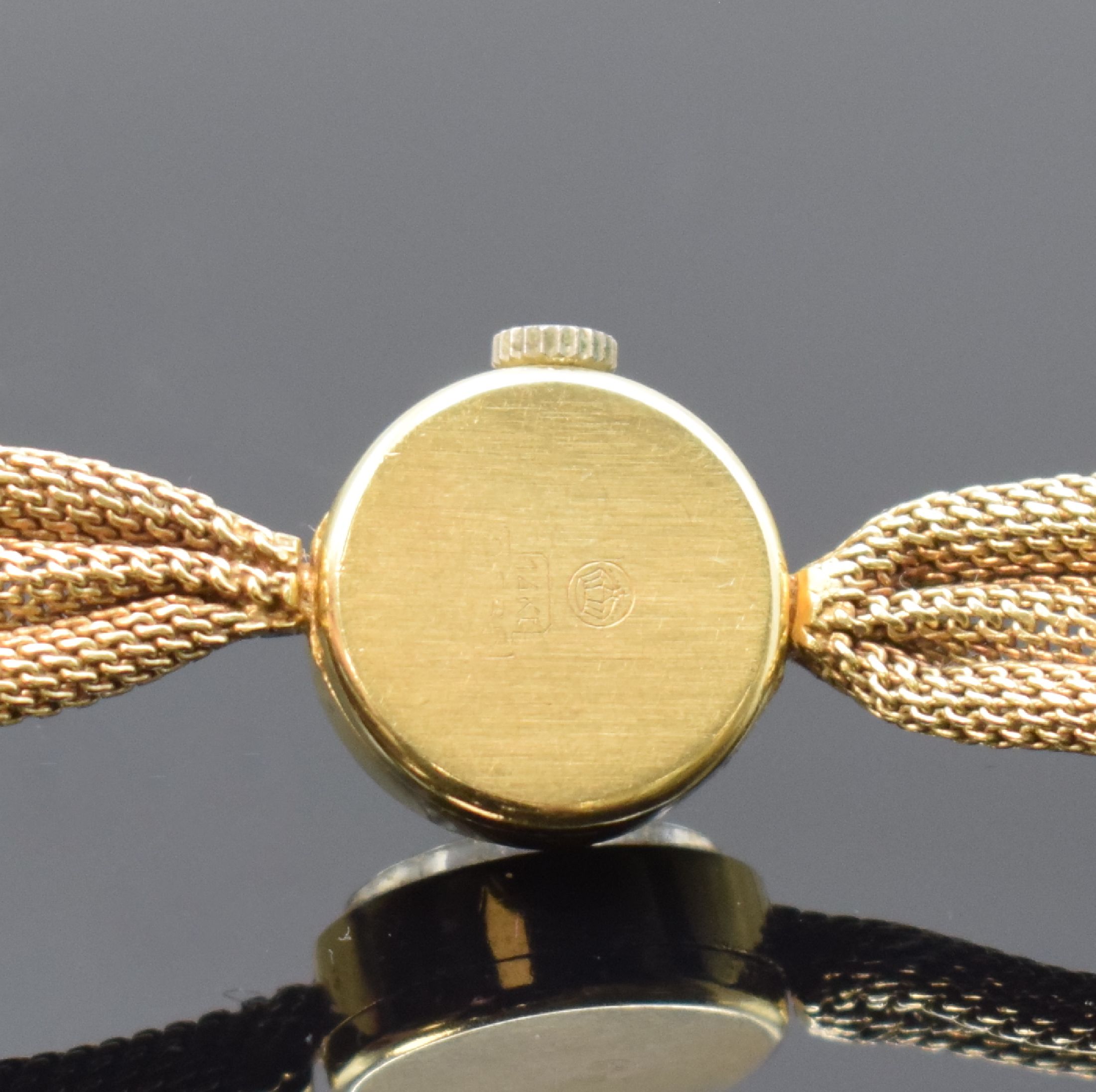 Detail c: ESCO Damenarmbanduhr in GG 585/000, Schweiz um 1965, Handaufzug, gedr. Geh., gefaltet anges. Milanaiseband, silb. Zifferbl. fl., gold. Indizes u. ...