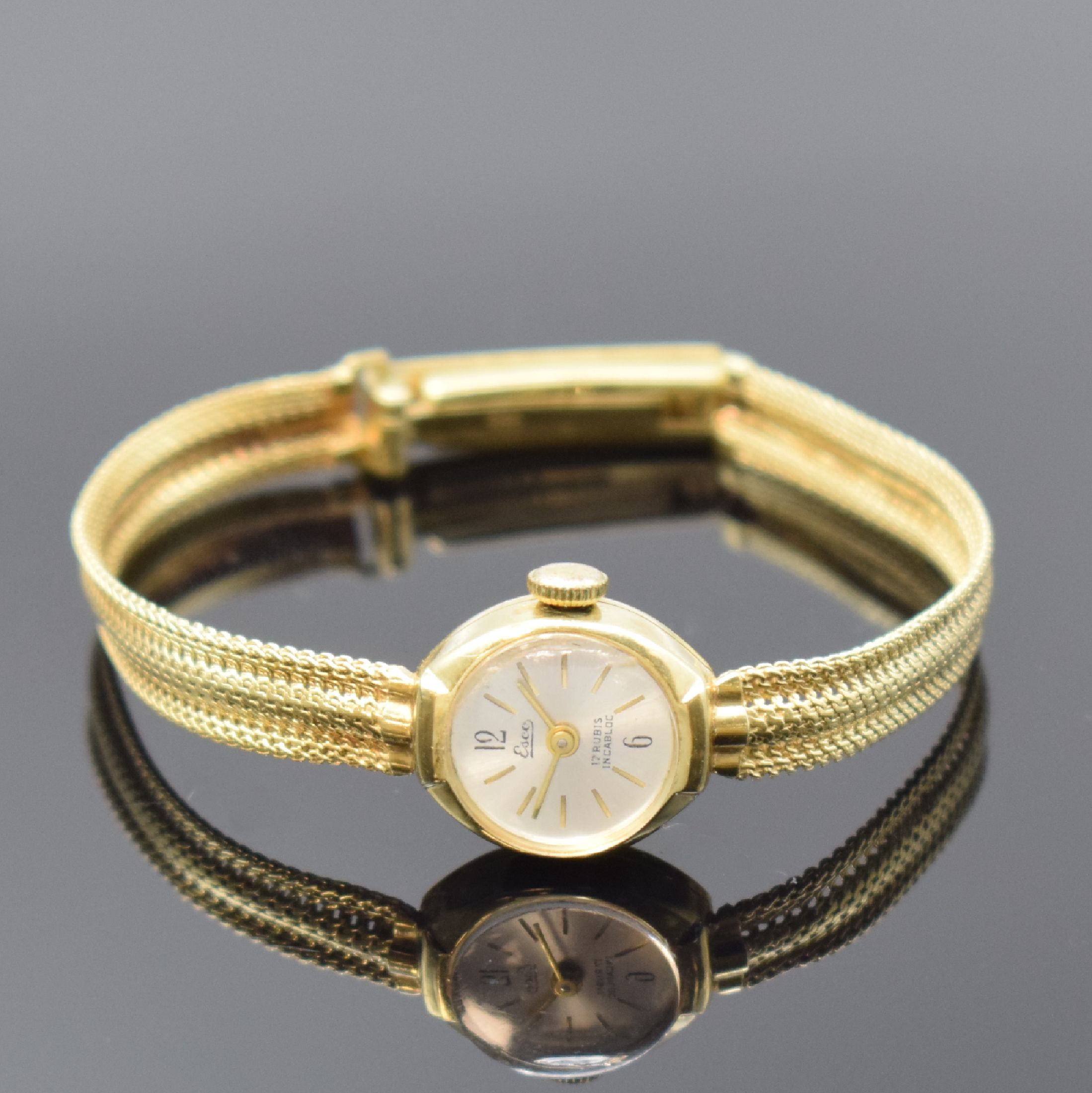 ESCO Damenarmbanduhr in GG 585/000, Schweiz um 1965, Handaufzug, gedr. Geh., anges. Milanaiseband, silb. Zifferbl., gold. Indizes u. -zeiger, ...