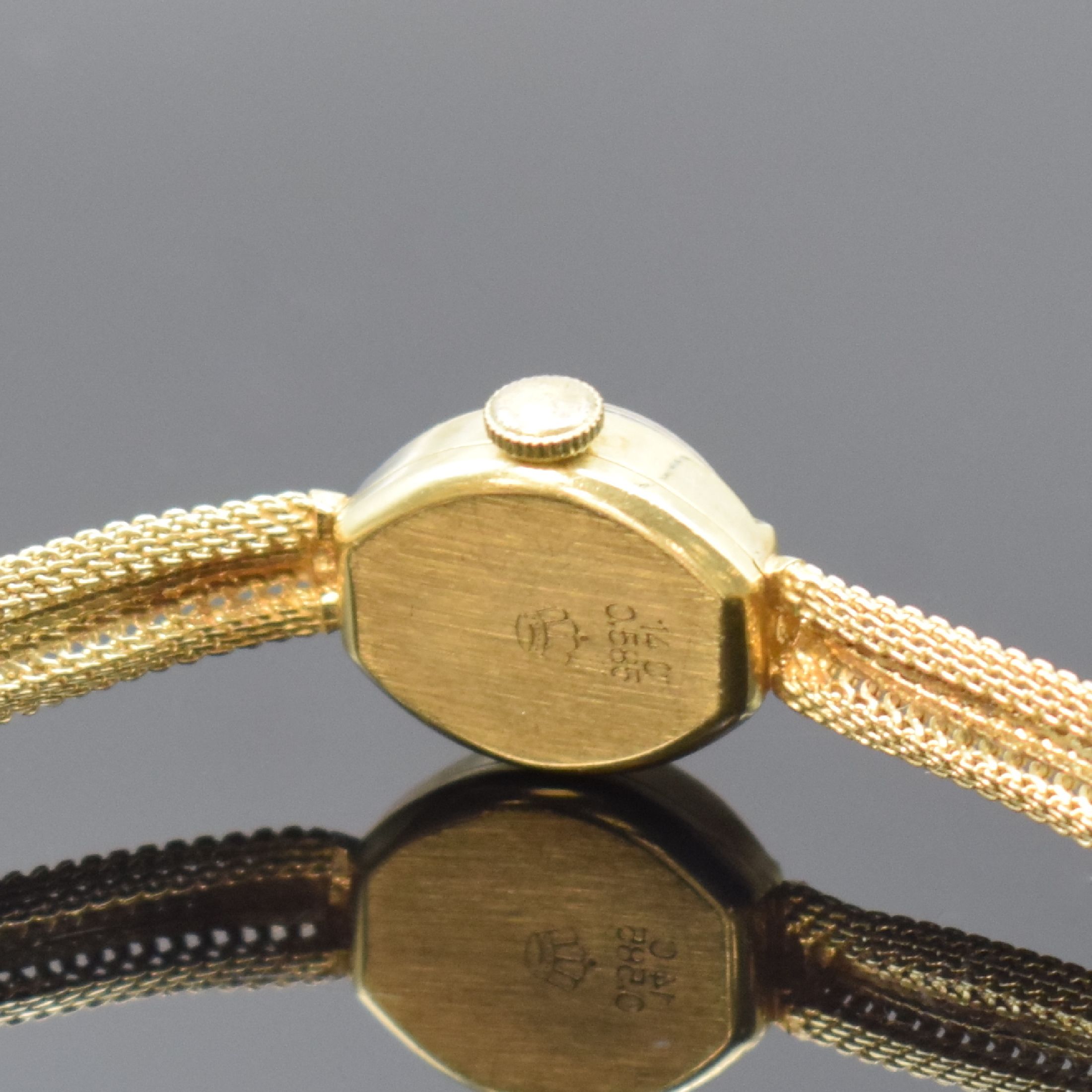 Detail c: ESCO Damenarmbanduhr in GG 585/000, Schweiz um 1965, Handaufzug, gedr. Geh., anges. Milanaiseband, silb. Zifferbl., gold. Indizes u. -zeiger, ...