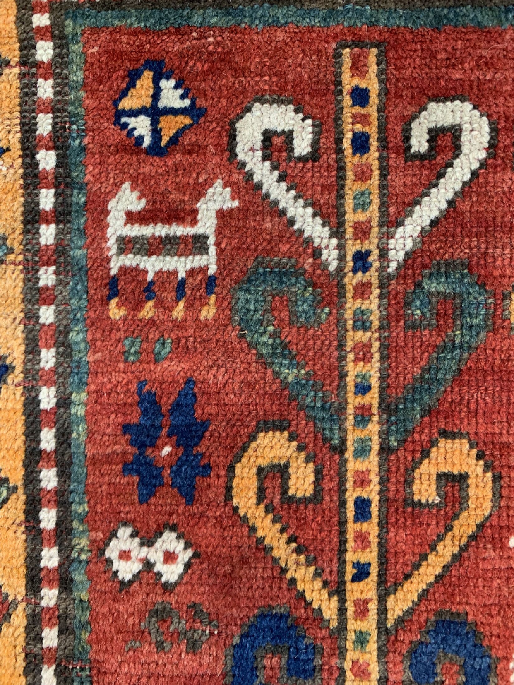 Detail d: Antiker Schildkazak, Kaukasus, 19.Jhd, Wolle auf Wolle, ca. 233 x 175 cm, EHZ: 2-3