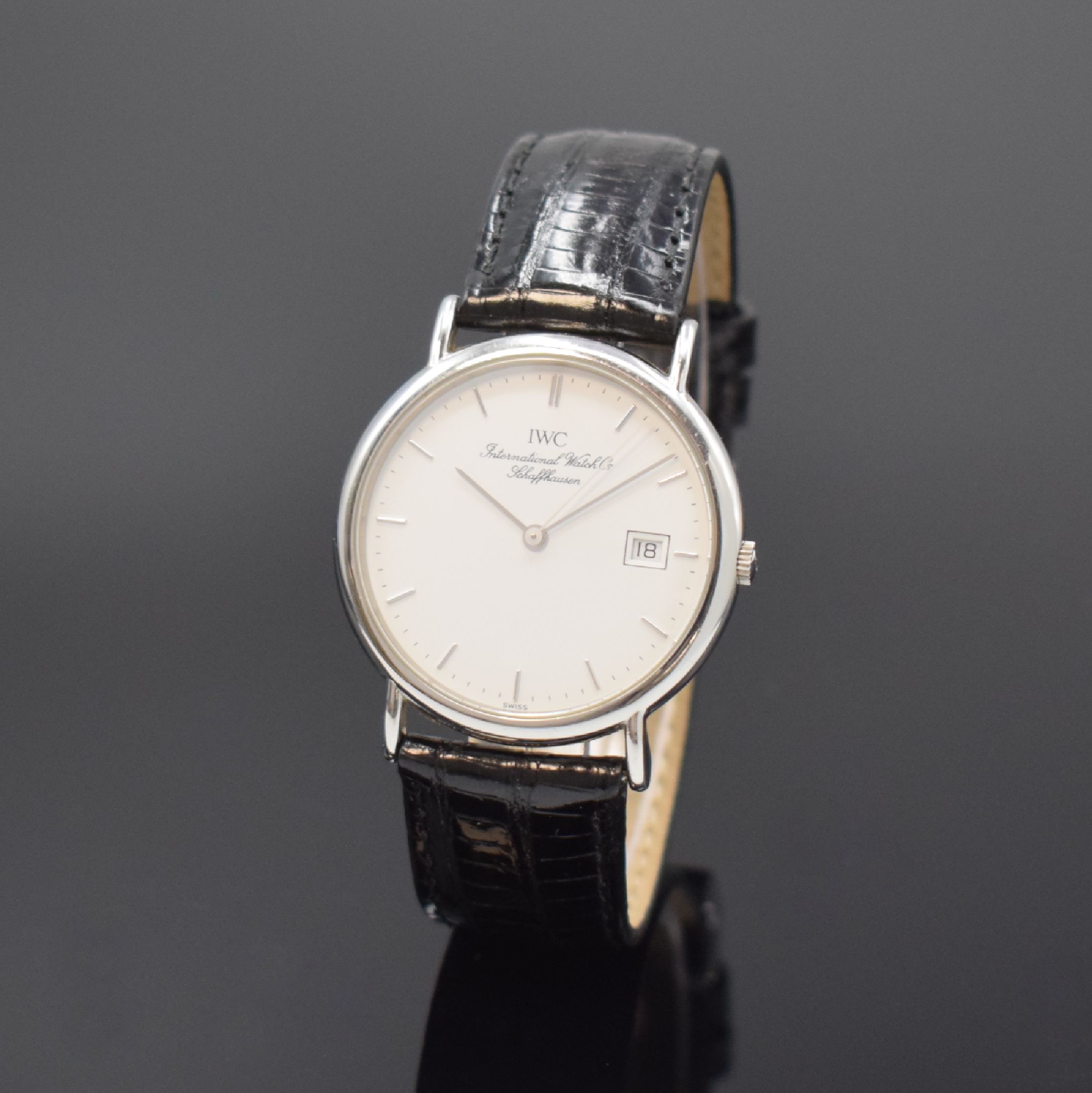 IWC Herrenarmbanduhr Serie Portofino, Schweiz um 1990, quarz, Edelstahlgeh., Boden 4-fach verschr., weißes Zifferbl., Anz. v. Std., Min., ...