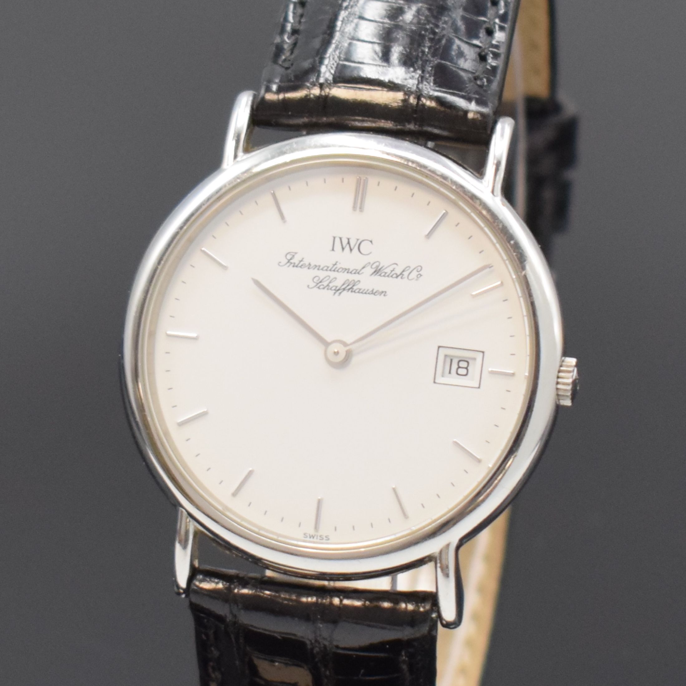 Detail a: IWC Herrenarmbanduhr Serie Portofino, Schweiz um 1990, quarz, Edelstahlgeh., Boden 4-fach verschr., weißes Zifferbl., Anz. v. Std., Min., ...