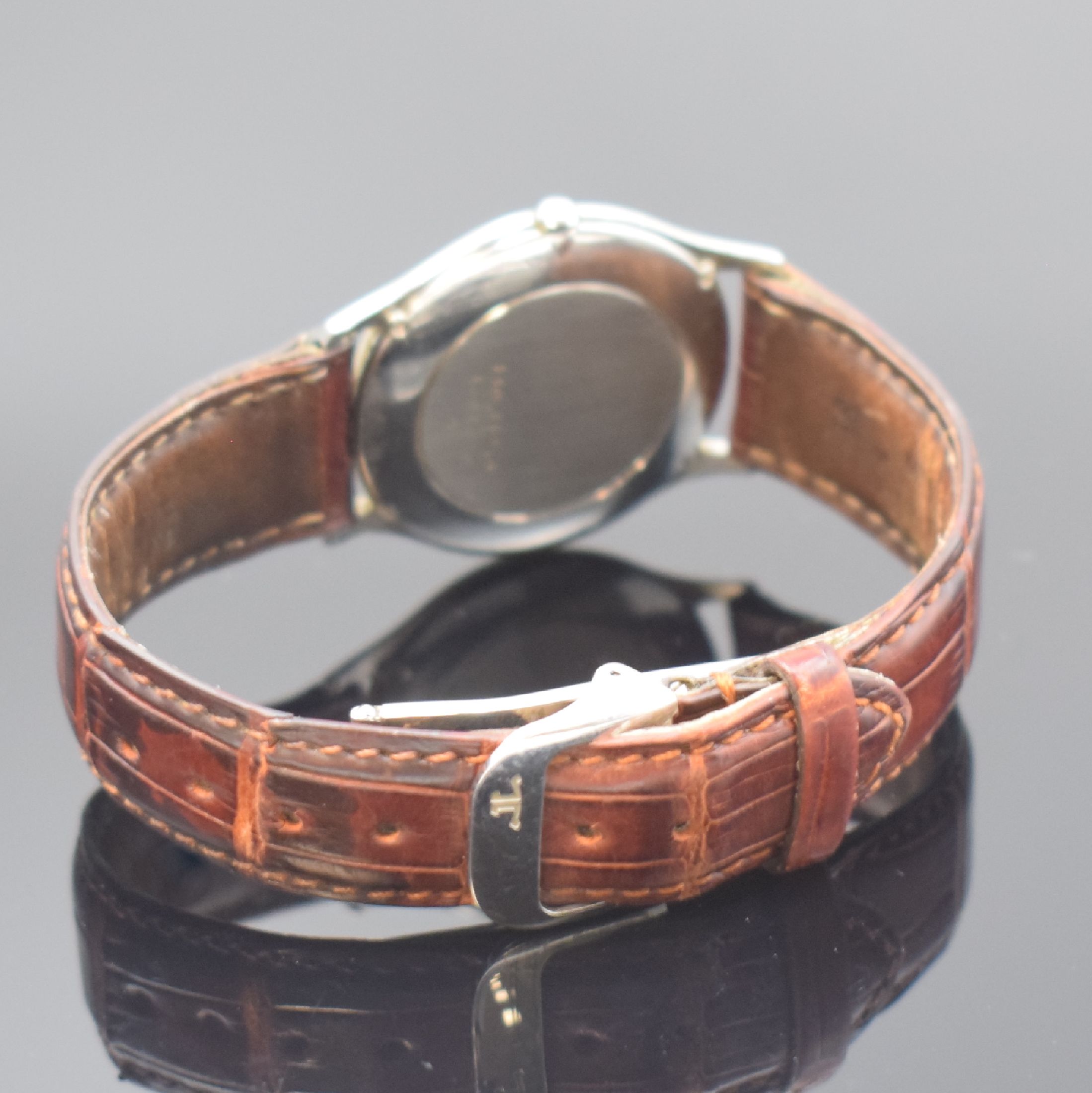 Detail b: Jaeger-LeCoultre Heraion flache Herrenarmbanduhr in Stahl/Gold Referenz 140.112.5, Schweiz um 1995, quarz, neutr. Lederband m. orig. dopp. Faltschl., ...