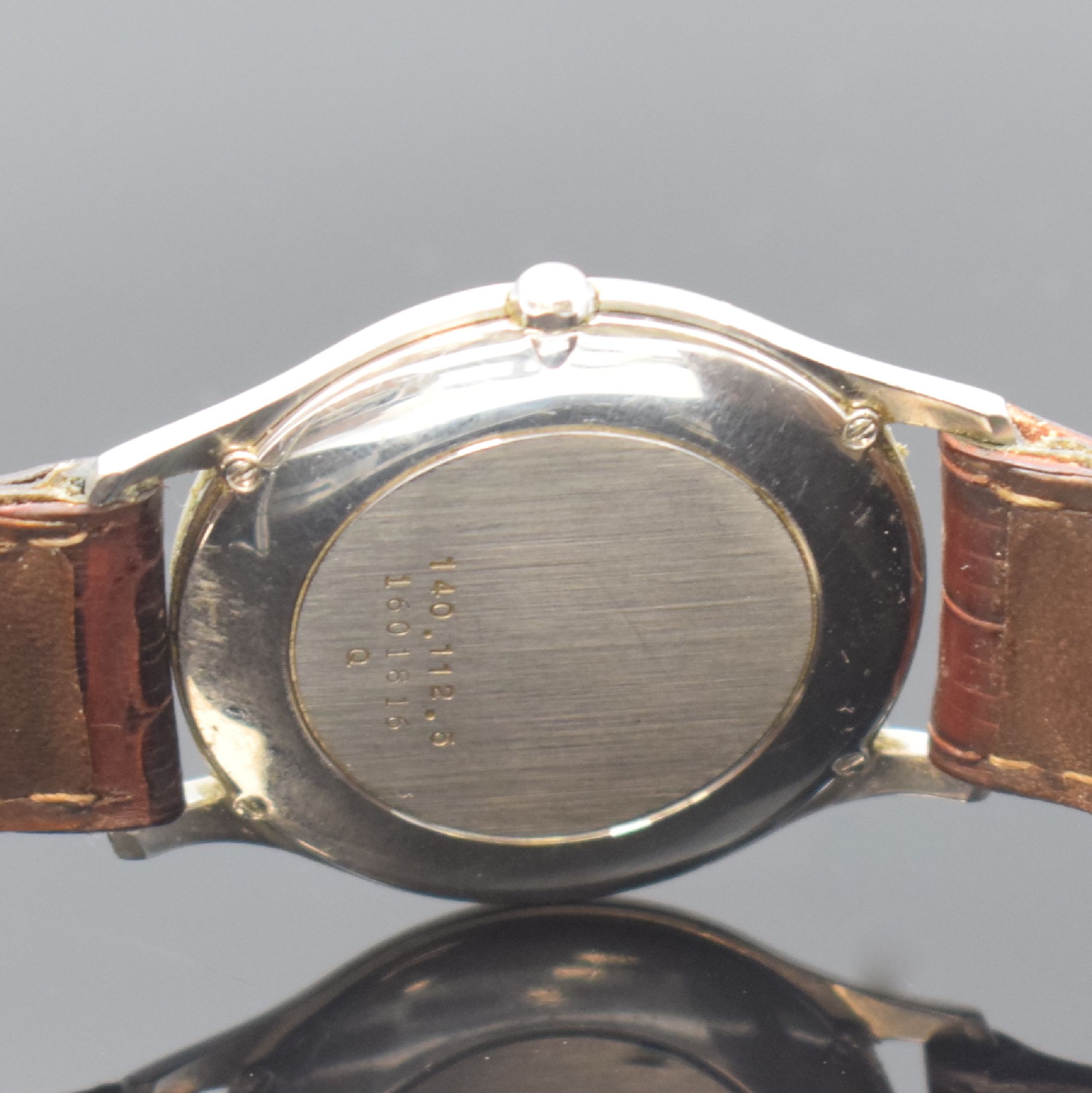 Detail d: Jaeger-LeCoultre Heraion flache Herrenarmbanduhr in Stahl/Gold Referenz 140.112.5, Schweiz um 1995, quarz, neutr. Lederband m. orig. dopp. Faltschl., ...