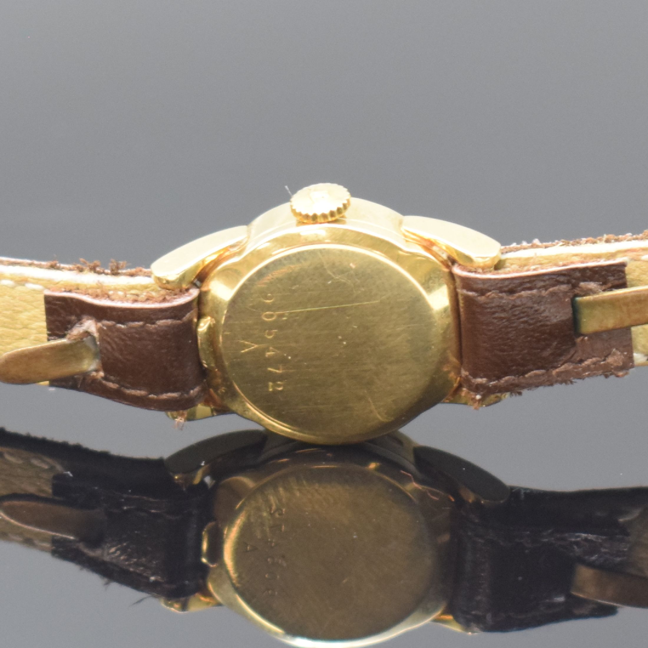 Detail c: Jaeger-LeCoultre Damenarmbanduhr in GG 750/000, Schweiz um 1965, Handaufzug, Boden gedr., silb. Zifferbl. m. gold. Std.-Ind. (teils angel.), gold. ...