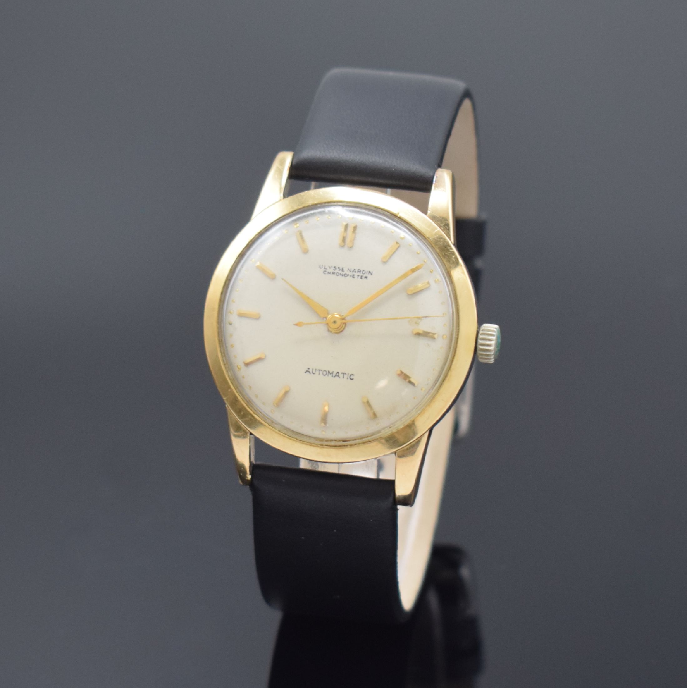 ULYSSE NARDIN Herrenarmbanduhr, Schweiz um 1960, Automatik, Edelstahlgeh. m. Goldhaube, Boden verschr., silb. Zifferbl. rest., gold. Std.-Ind., gold. ...