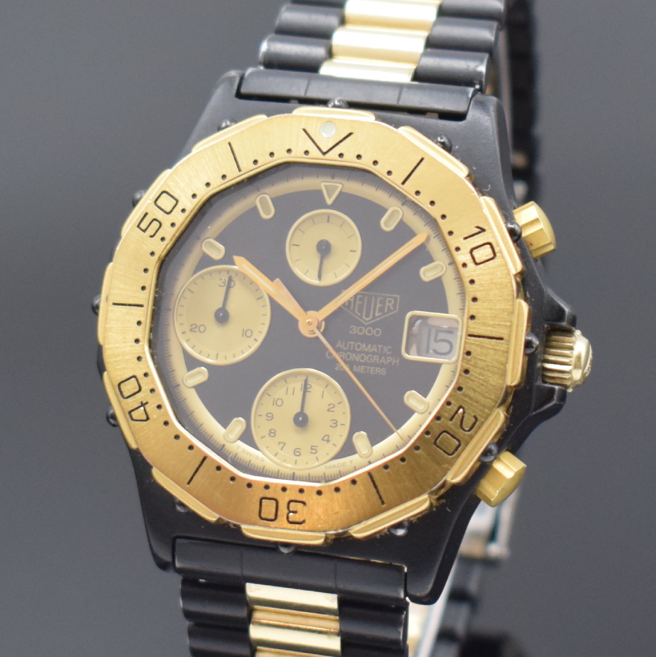 Detail a: HEUER 3000 seltene Herrenarmbanduhr mit Chronograph Referenz 136.006, Schweiz um 1985, Automatik, Stahlgehäuse teils verg. bzw. geschwärzt, orig. ...