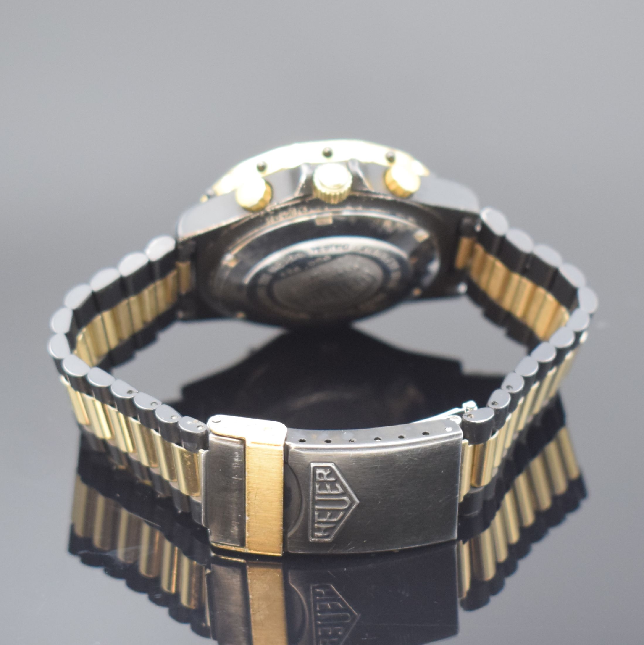 Detail b: HEUER 3000 seltene Herrenarmbanduhr mit Chronograph Referenz 136.006, Schweiz um 1985, Automatik, Stahlgehäuse teils verg. bzw. geschwärzt, orig. ...