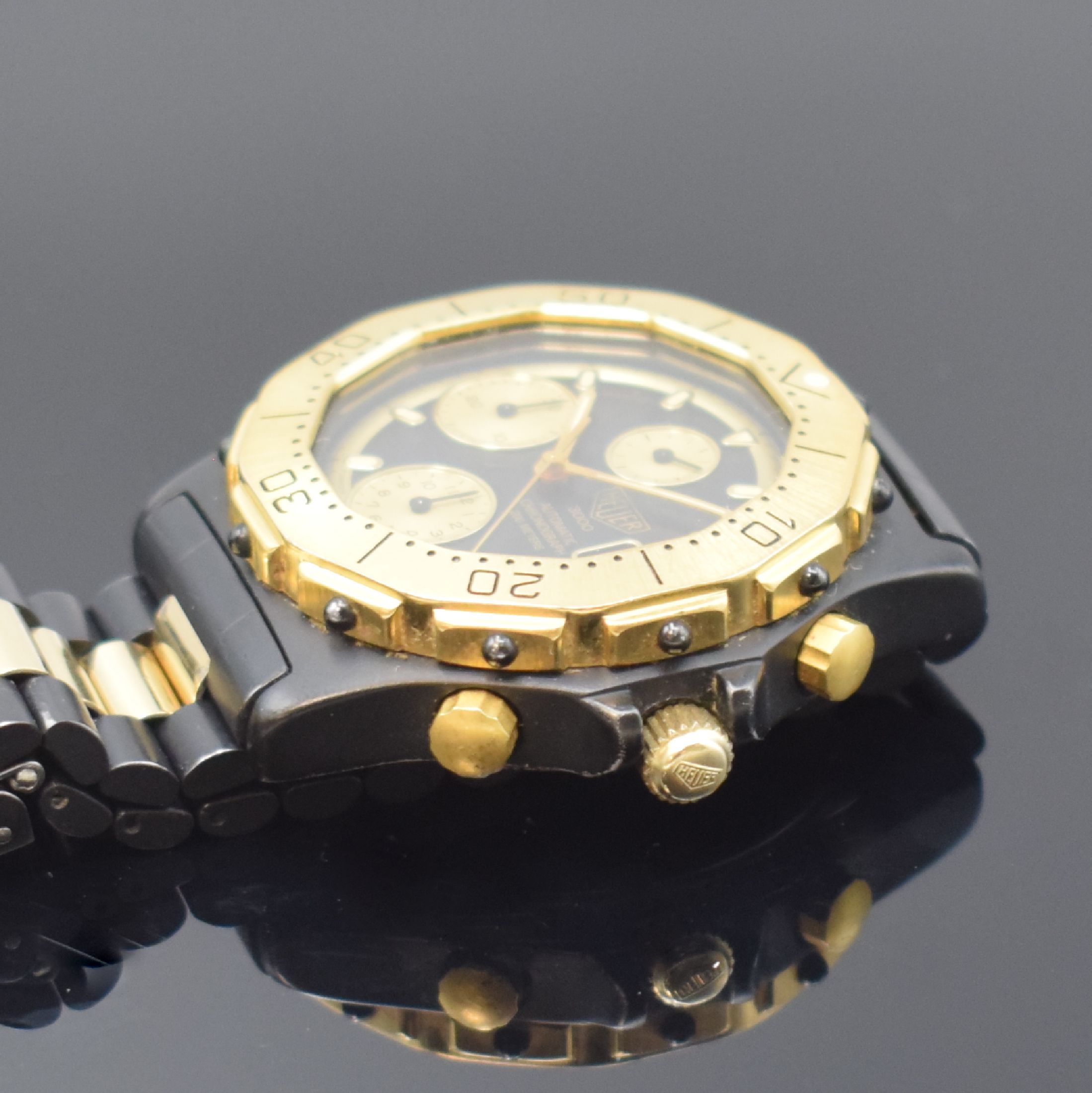 Detail c: HEUER 3000 seltene Herrenarmbanduhr mit Chronograph Referenz 136.006, Schweiz um 1985, Automatik, Stahlgehäuse teils verg. bzw. geschwärzt, orig. ...