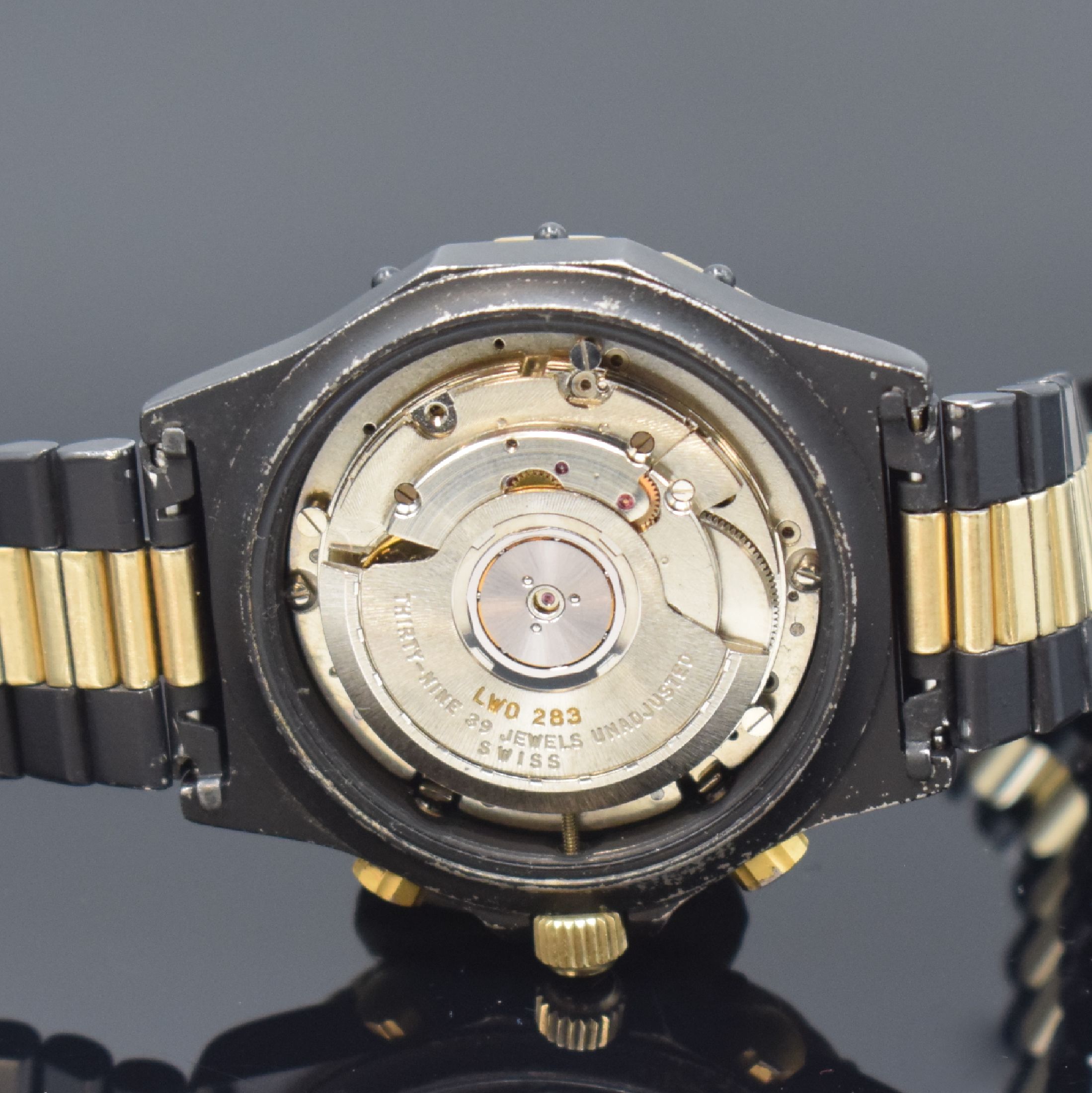Detail f: HEUER 3000 seltene Herrenarmbanduhr mit Chronograph Referenz 136.006, Schweiz um 1985, Automatik, Stahlgehäuse teils verg. bzw. geschwärzt, orig. ...