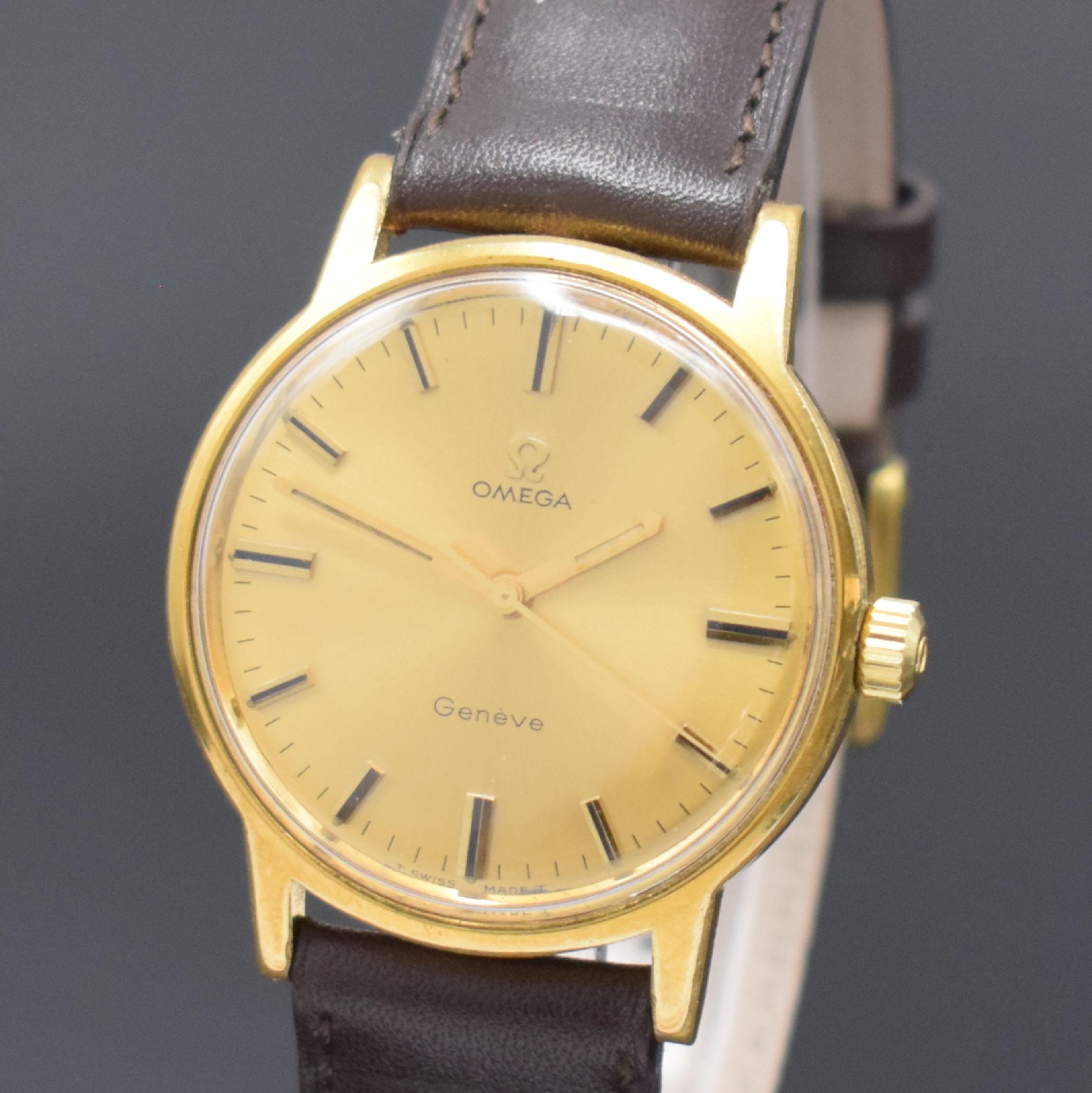 Detail a: OMEGA Geneve vergoldete Herrenarmbanduhr Referenz 135.070, Schweiz um 1970, Handaufzug, verschr. Stahlboden, orig. Krone, gold. Zifferbl., gold. ...