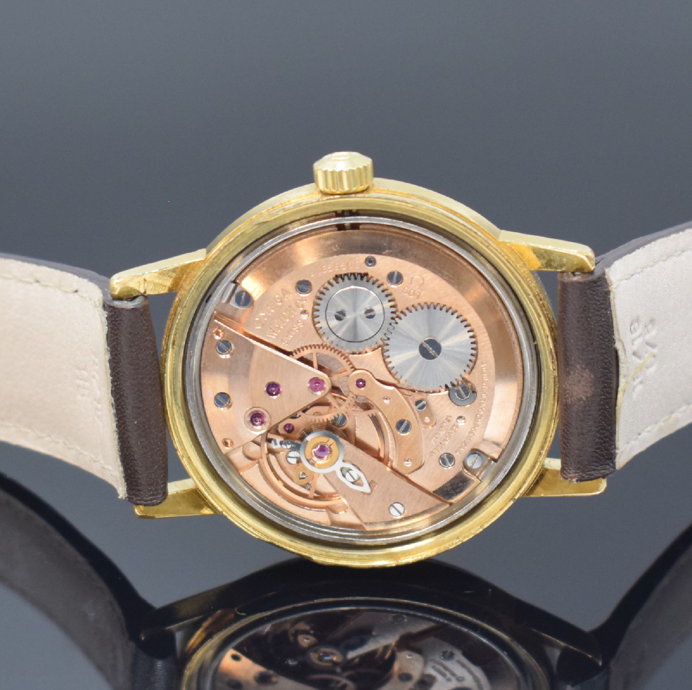 Detail d: OMEGA Geneve vergoldete Herrenarmbanduhr Referenz 135.070, Schweiz um 1970, Handaufzug, verschr. Stahlboden, orig. Krone, gold. Zifferbl., gold. ...