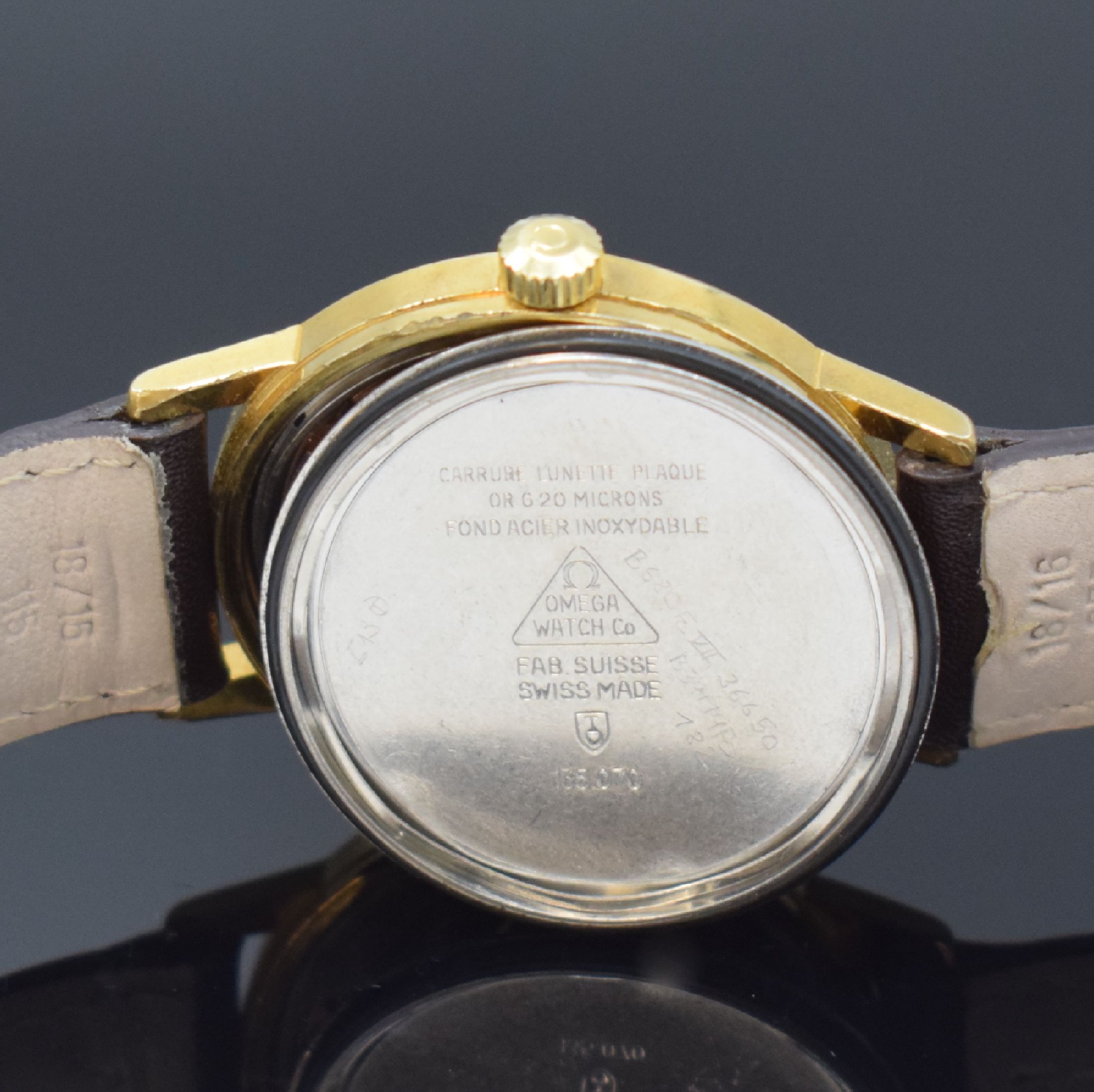 Detail e: OMEGA Geneve vergoldete Herrenarmbanduhr Referenz 135.070, Schweiz um 1970, Handaufzug, verschr. Stahlboden, orig. Krone, gold. Zifferbl., gold. ...