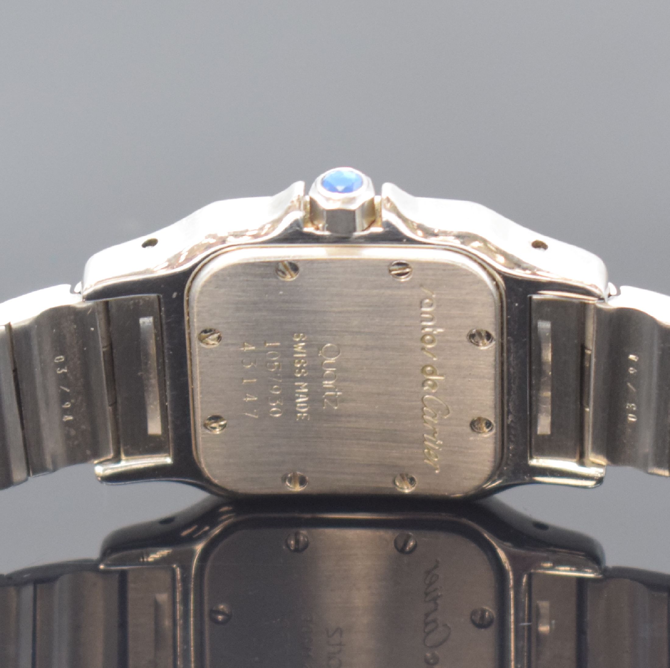 Detail d: CARTIER Santos Referenz 1057930 Damenarmbanduhr in Stahl/Gold, Schweiz um 2000, quartz, leicht gebogenes Geh., Boden 8- fach verschr., orig. ...