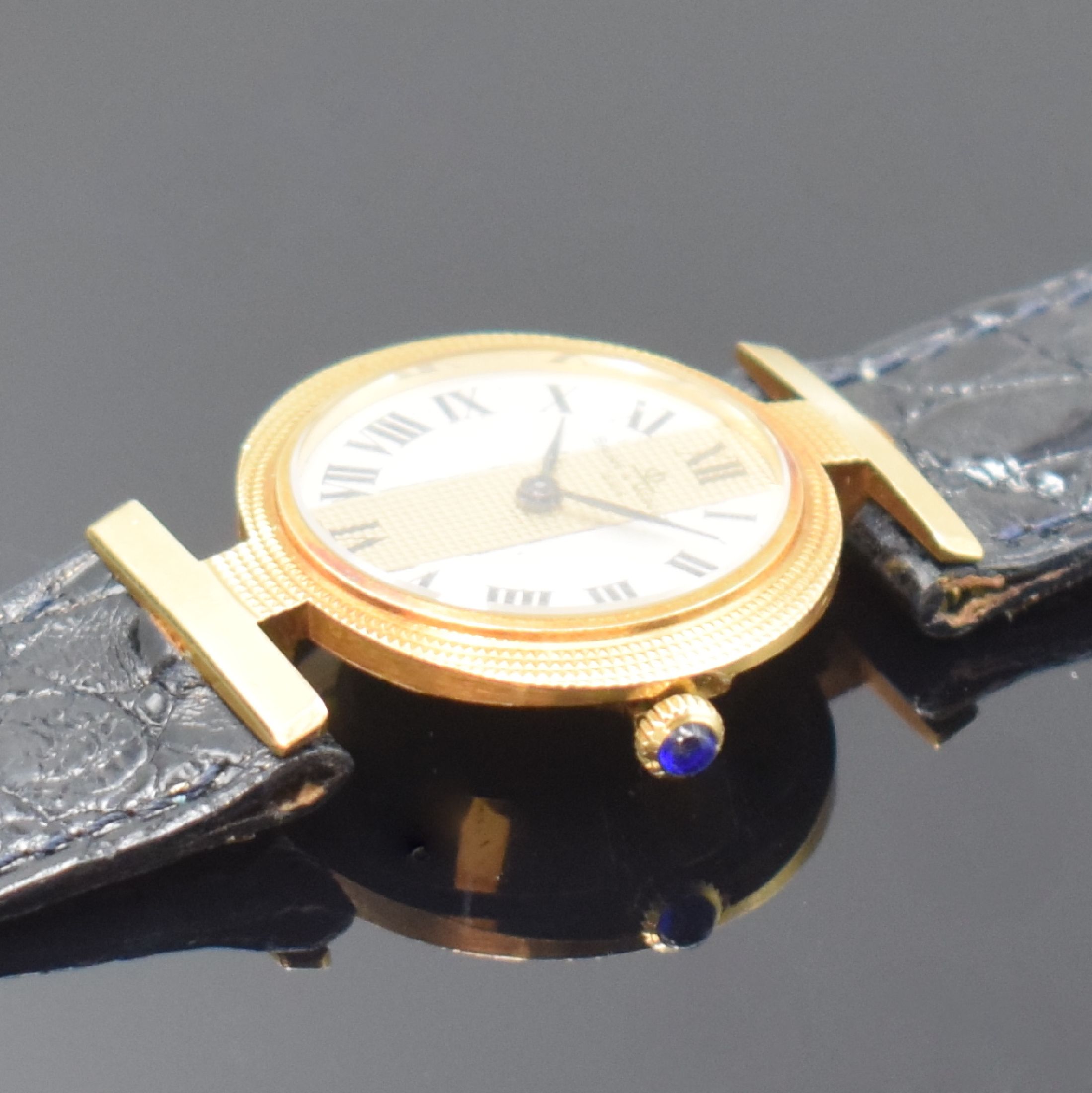 Detail c: BAUME & MERCIER Damenarmbanduhr in GG 750/000, Schweiz um 1975, Handaufzug, Boden aufgedr., orig. Lederband m. verg. Dornschl., Schmuckkrone, ...